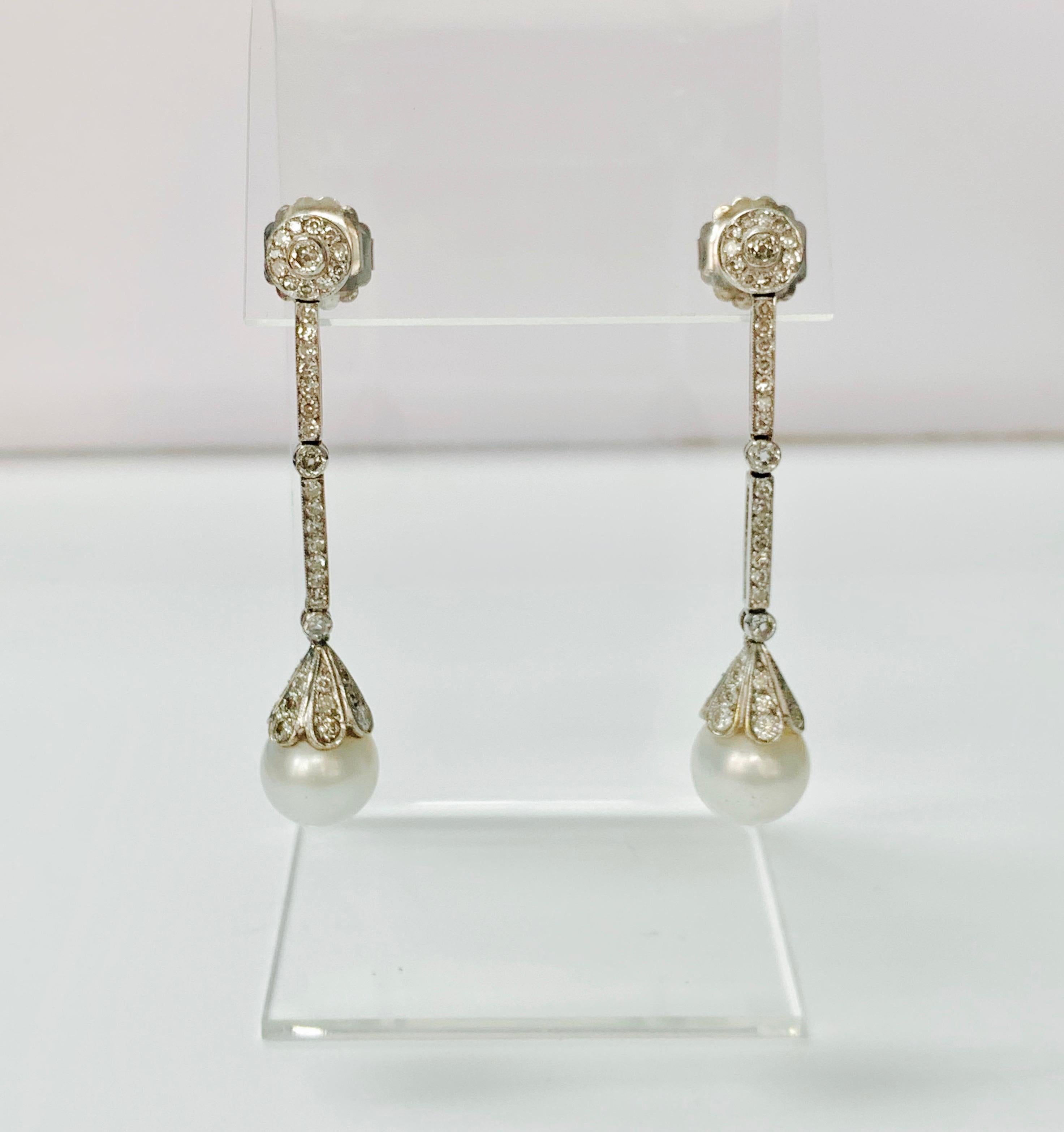 Diamond and south sea pearl chandelier earrings beautifully handmade in 18k white gold.
The details are as follows : 
Diamond weight: 2.75 carats ( I color and SI clarity ) 
Metal: 18K white gold 



