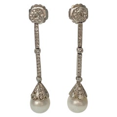 Boucles d'oreilles chandelier en or blanc 18 carats avec diamants et perles des mers du Sud