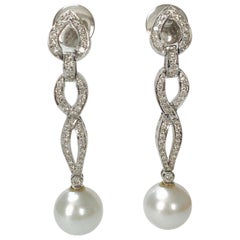 Boucles d'oreilles en or blanc 18 carats avec diamants et perles des mers du Sud