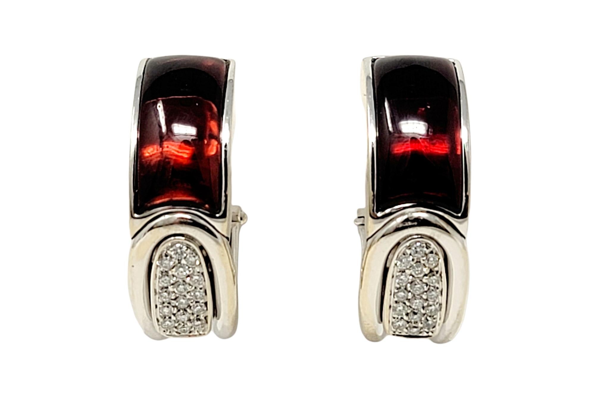 These unique and contemporary diamond and spessartite garnet huggie hoop add a pop of color and glamour to any look. The curved shape gently hugs the ear for a contoured and secure fit, while the sparkling pave diamonds shimmer against the warm