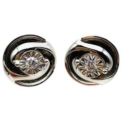 Diamond and sterling silver stud earrings