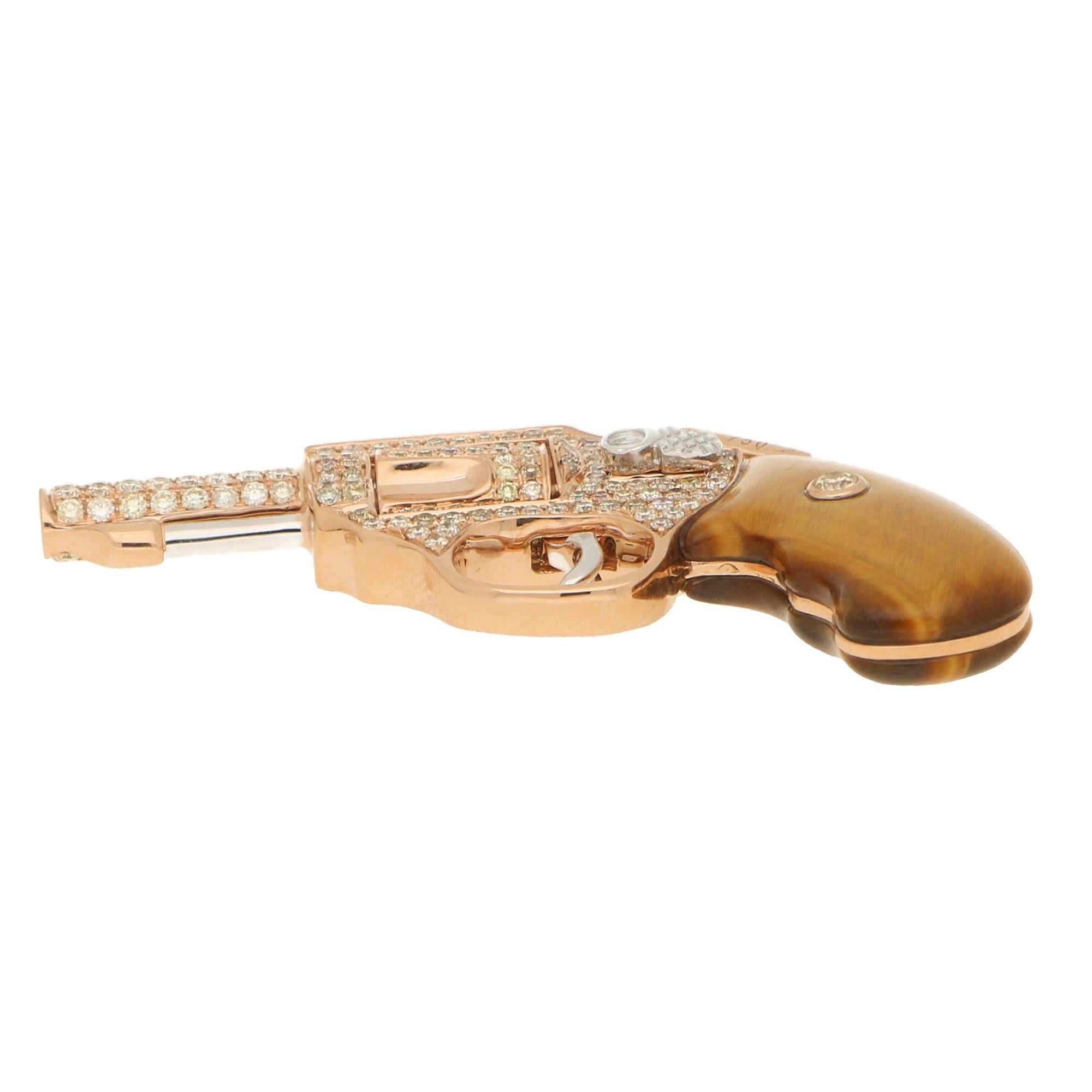 gold revolver pendant