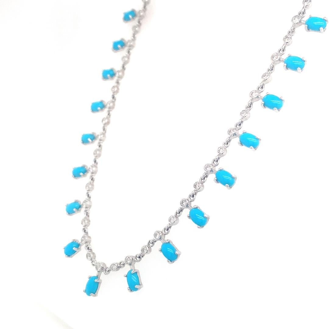 Natural 0.81-carat diamond and 4.39-carat turquoise drop necklace set in 14-karat white gold with an adjustable necklace chain setting. 