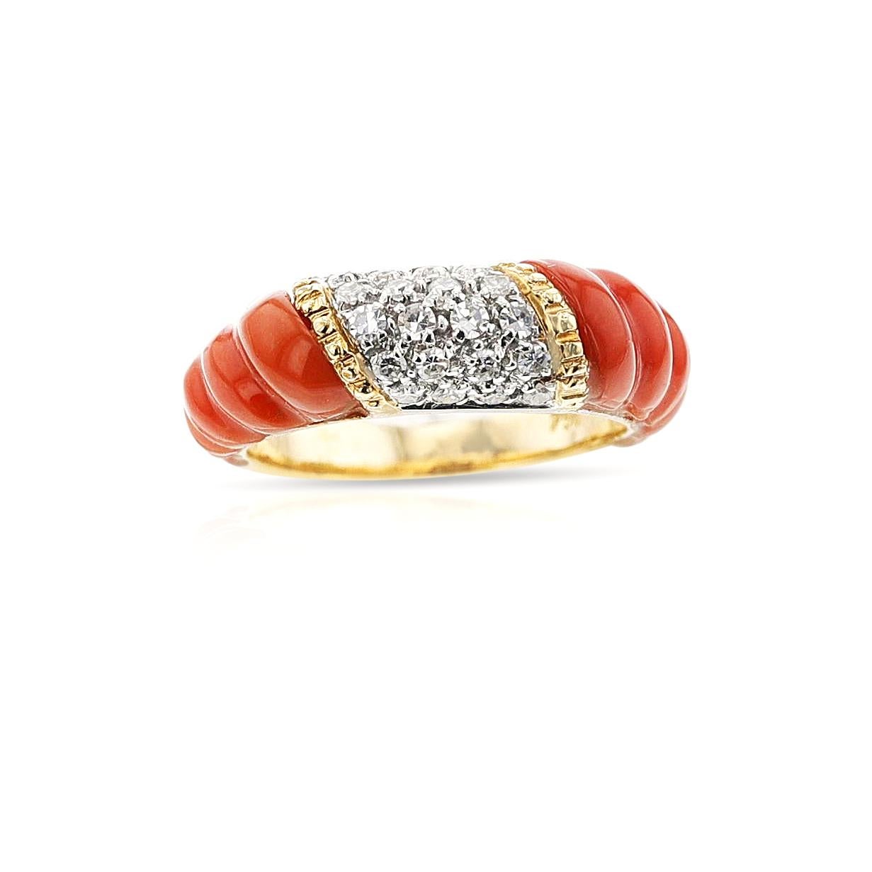 A Diamond and Twisted Coral Gold Ring made in 18k Yellow Gold. Ring Size US 5.50.  The total weight of the ring is 4.93 grams.


SKU: 1114-CJARTYU