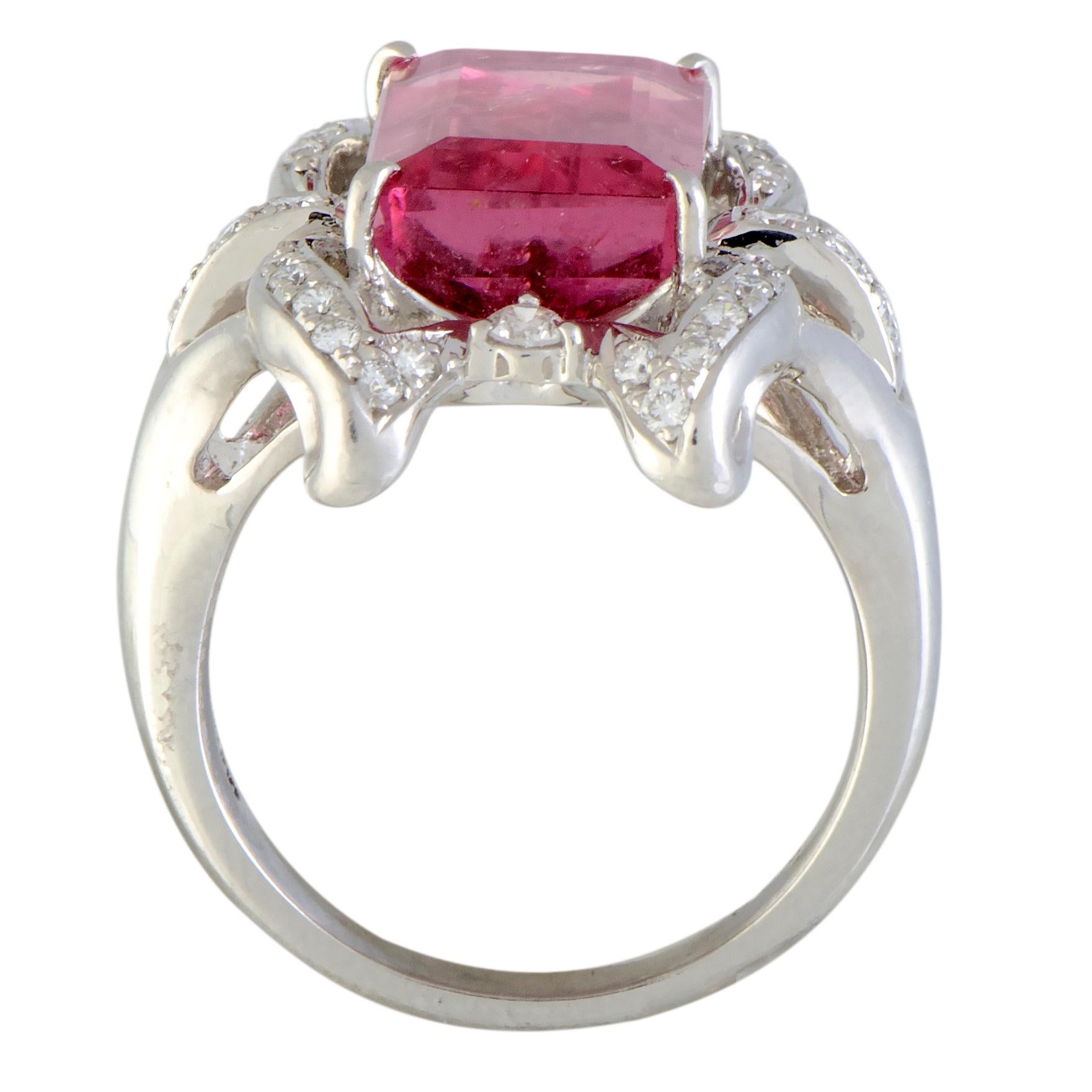 A fascinating fusion of luxe refinement and feminine allure, this spellbinding jewelry piece compels with its sublime design and lustrous décor. The ring is wonderfully crafted from platinum and it is embellished with an attractive tourmaline that