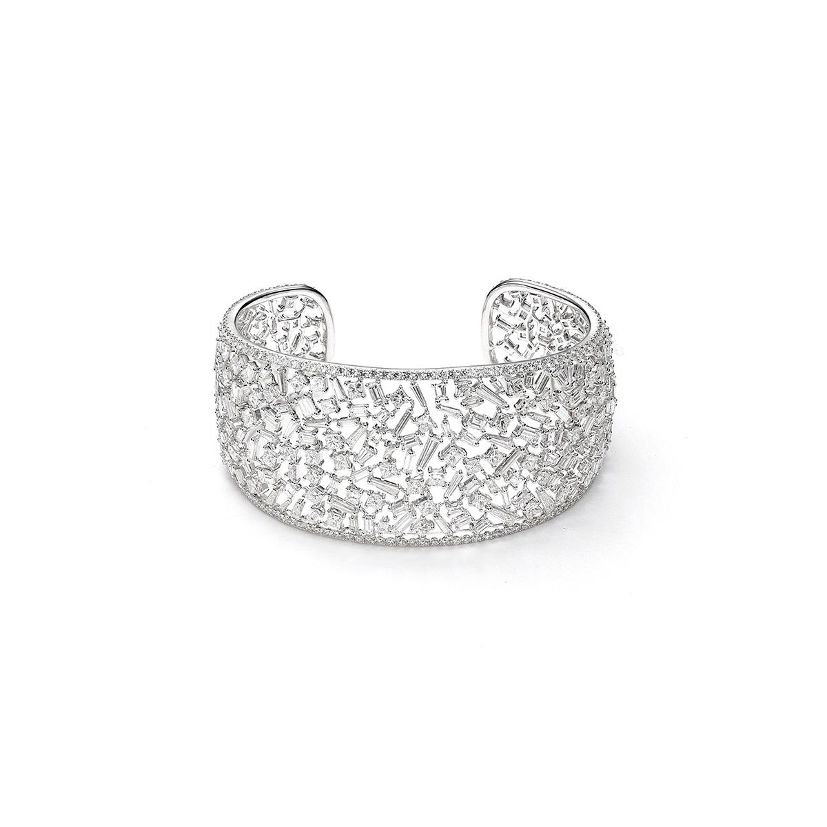 Bangle in 18kt white gold set with 280 diamonds baguette, princess, square and tapers 15.54 cts and 186 diamonds 3.12 carat.