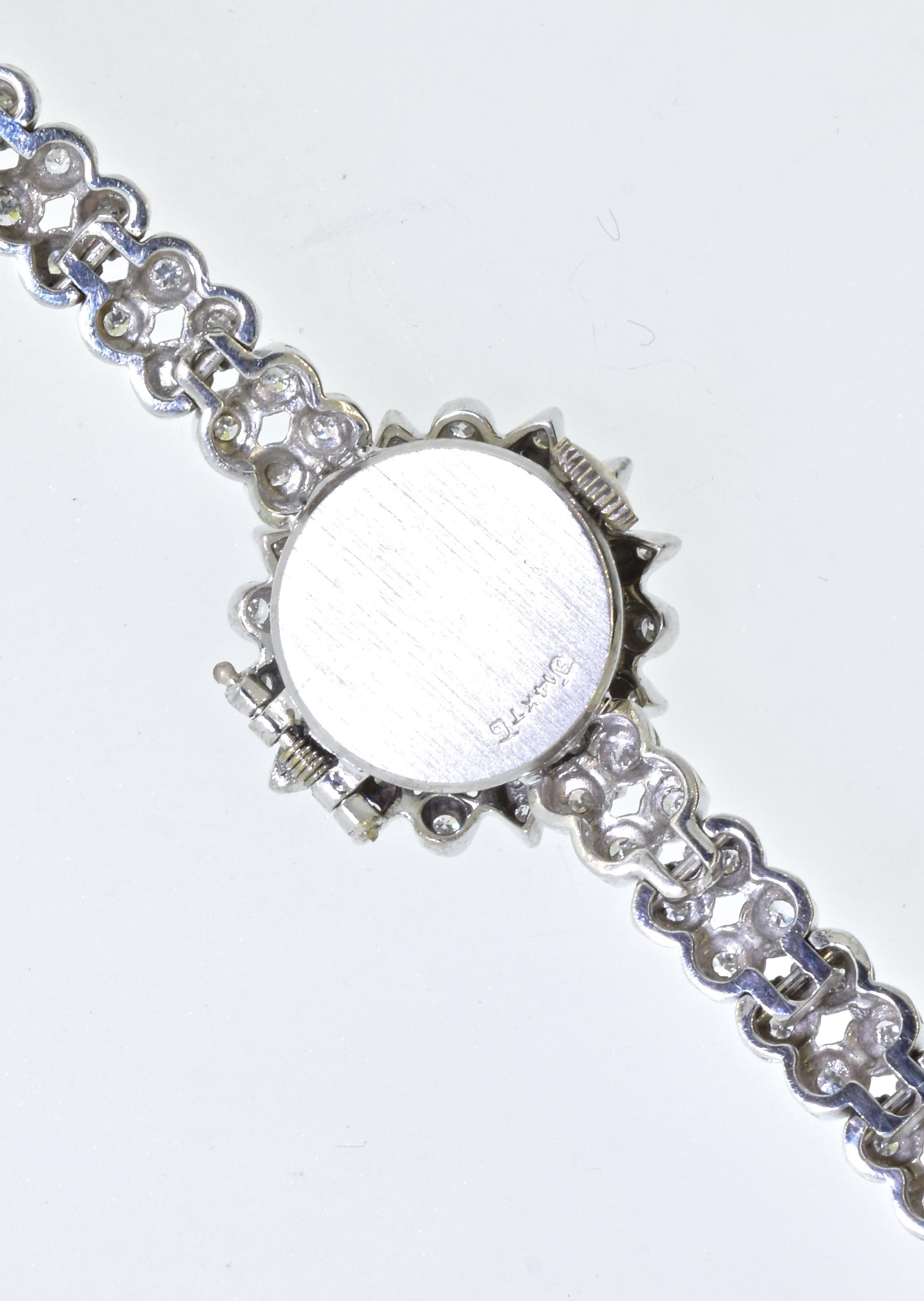Diamond and White Gold Bracelet with Hidden Watch, Croton, circa 1960 In Excellent Condition In Aspen, CO
