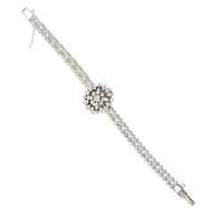 Bracelet en or blanc et diamants avec montre cachée:: Croton:: vers 1960