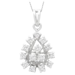 Diamond and White Gold Cluster Pendant