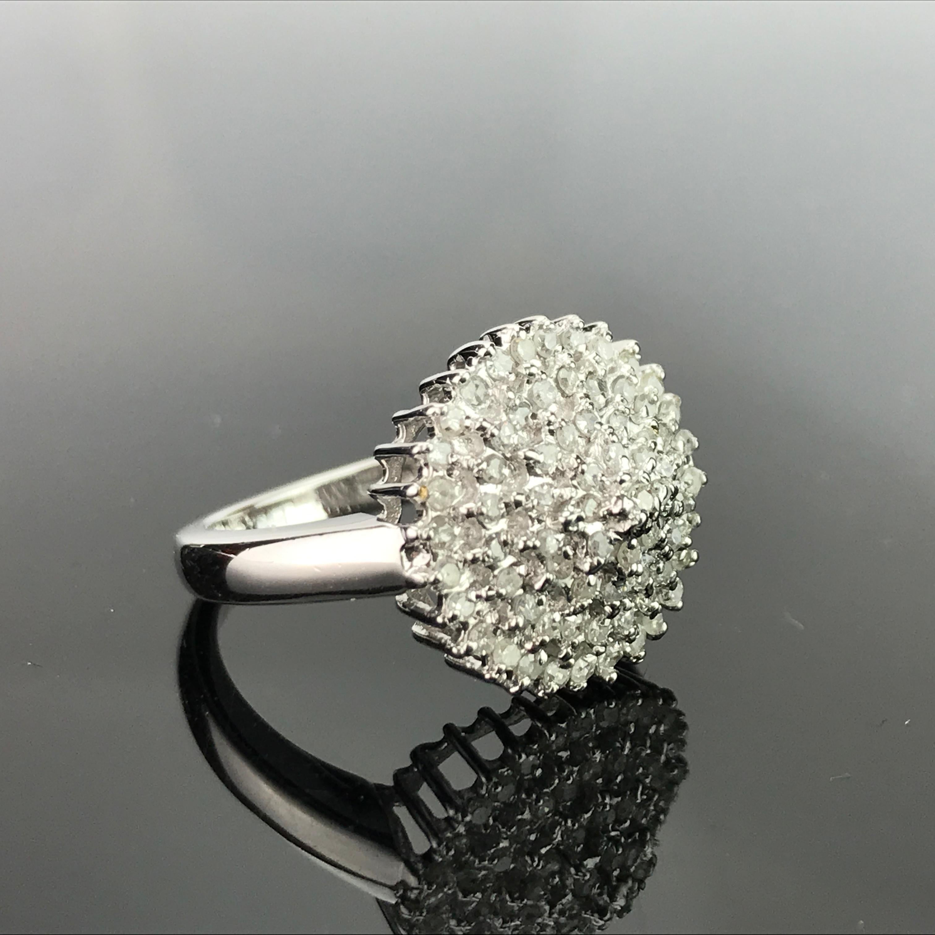 A clustered 0.5 carat White Diamond Ring all set in 14K White Gold. Ring size can be altered according to the client.

