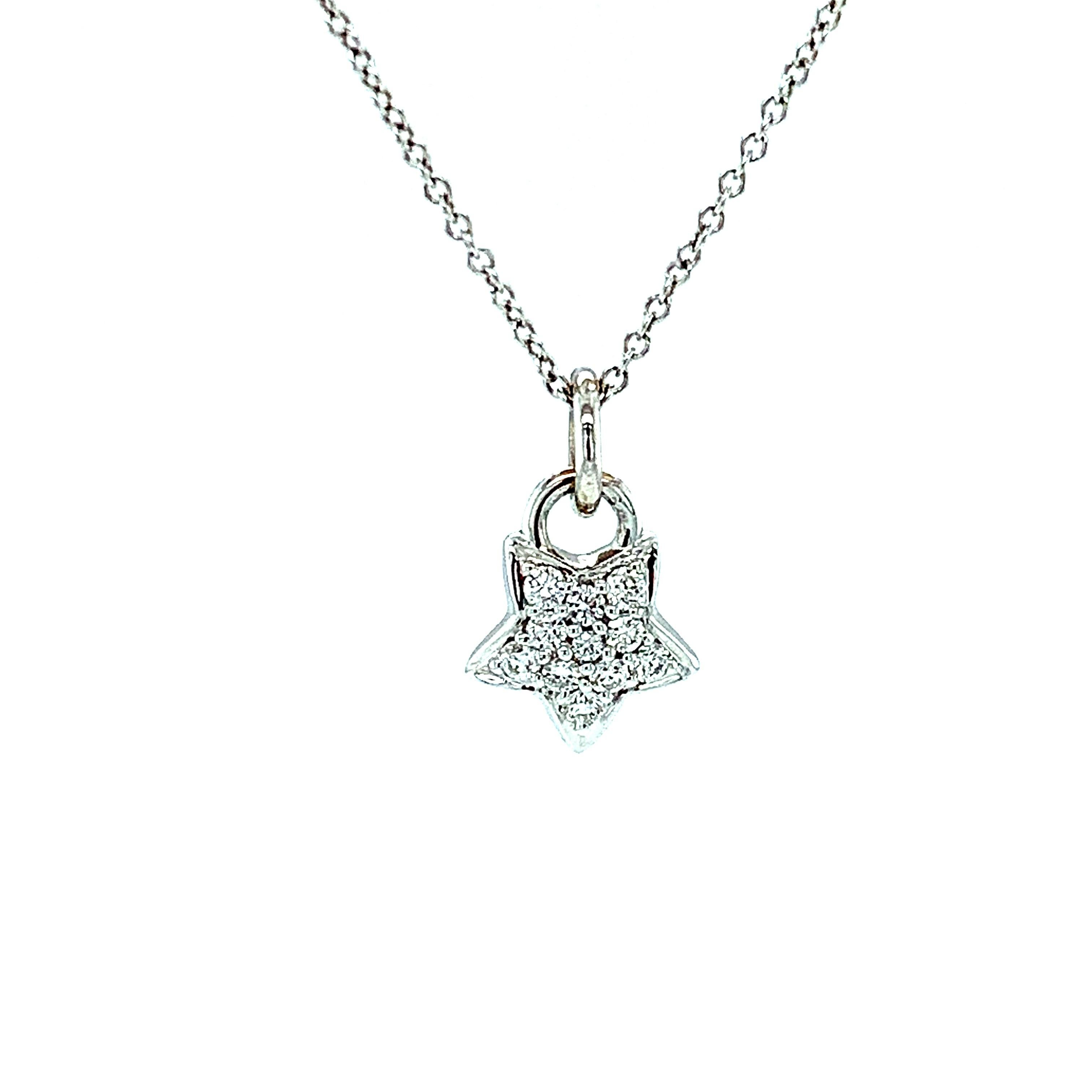 When you wish upon a star, makes no difference who you are...diamonds are forever and for everyone! This petite diamond-studded star pendant is simply stunning, with sparkling white diamonds have set in high-polished 18k white gold. With the star
