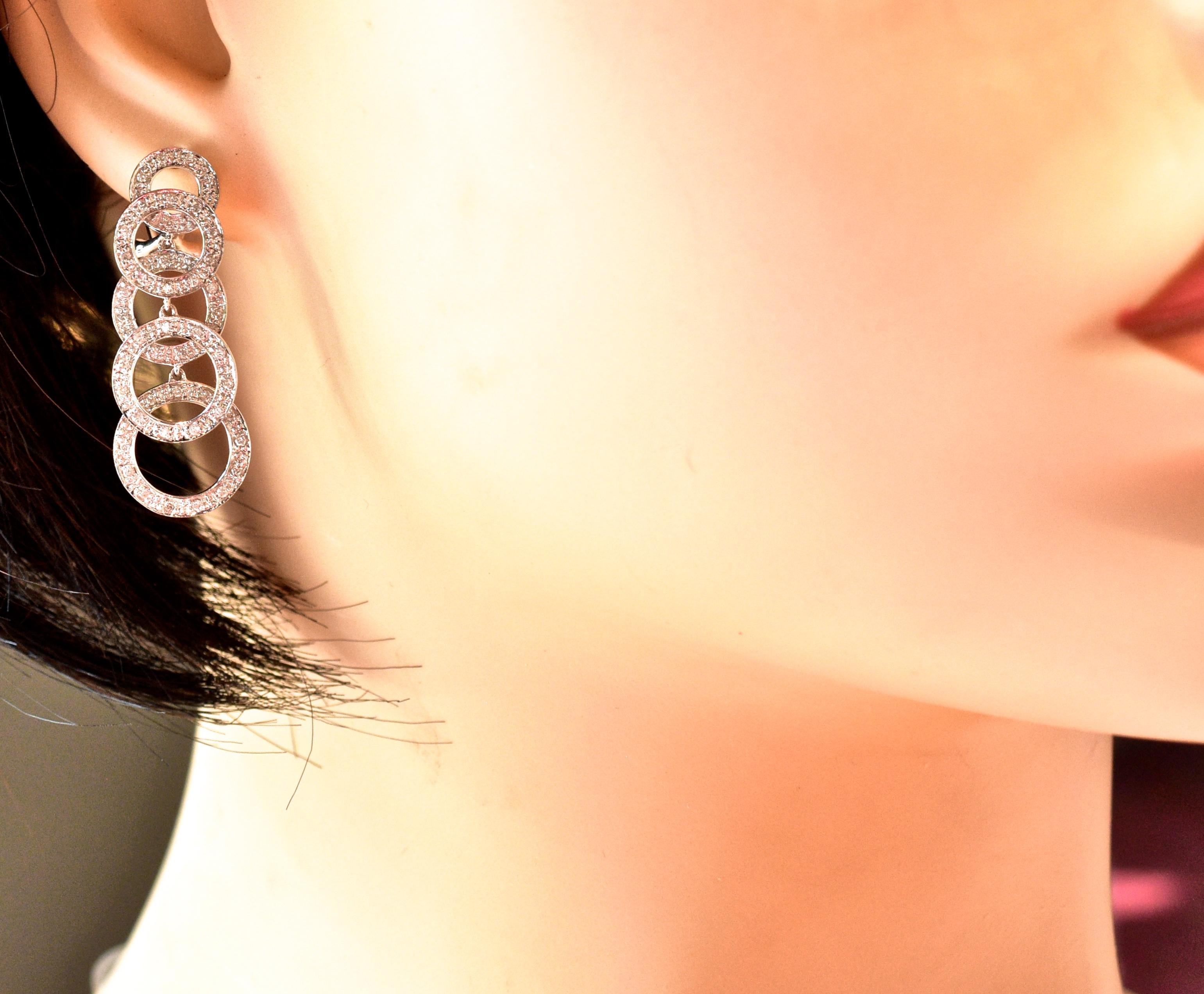 Contemporary Diamond and White Gold Dangling Earrings