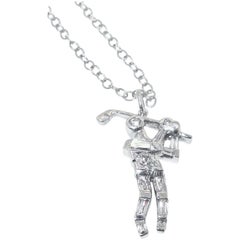 Diamond and White Gold Golfing Pendant