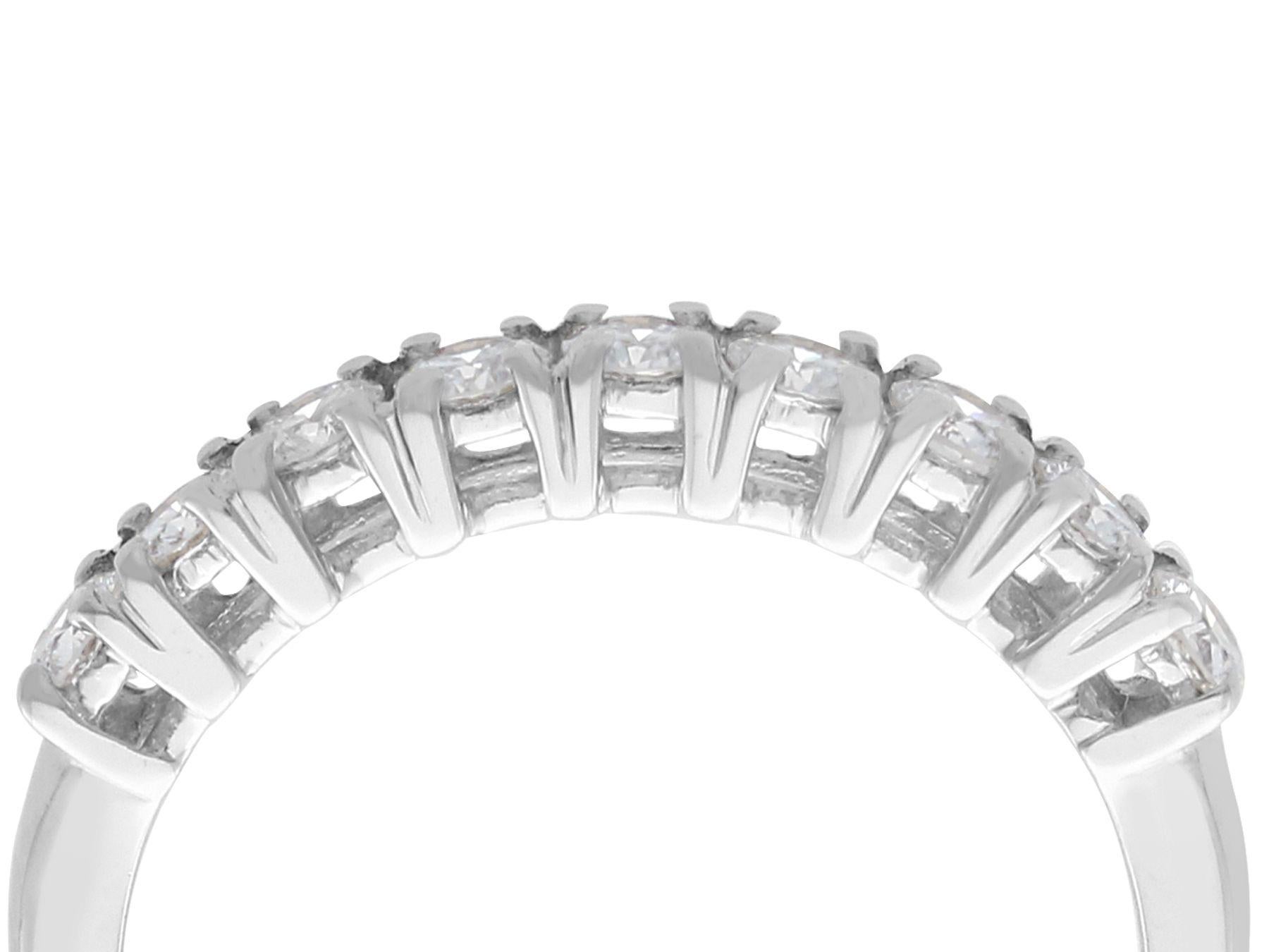 An impressive vintage 1970s 0.36 carat diamond and 18 karat white gold half eternity ring; part of our diverse vintage jewelry and estate jewelry collections.

This fine and impressive gold half eternity ring has been crafted in 18k white gold.

The