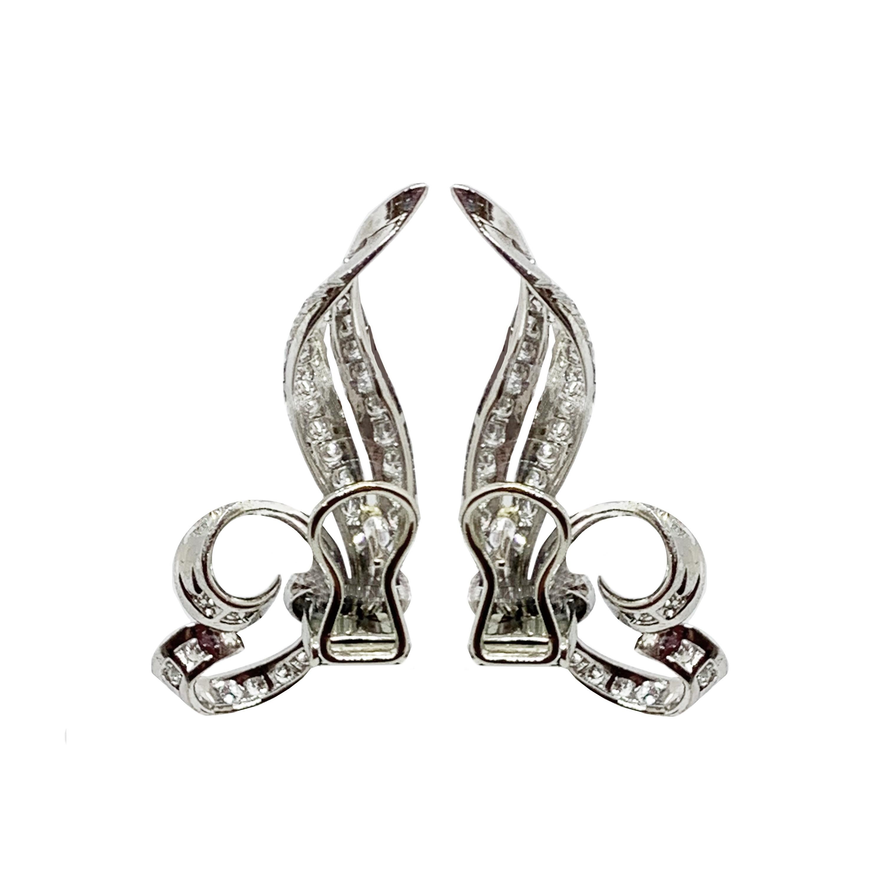 Pair of elegant earrings in white gold and diamonds. Hand made in Italy in the '50s design. Typical style of the Dolce Vita period! 
Approximately 2 kt diamonds 