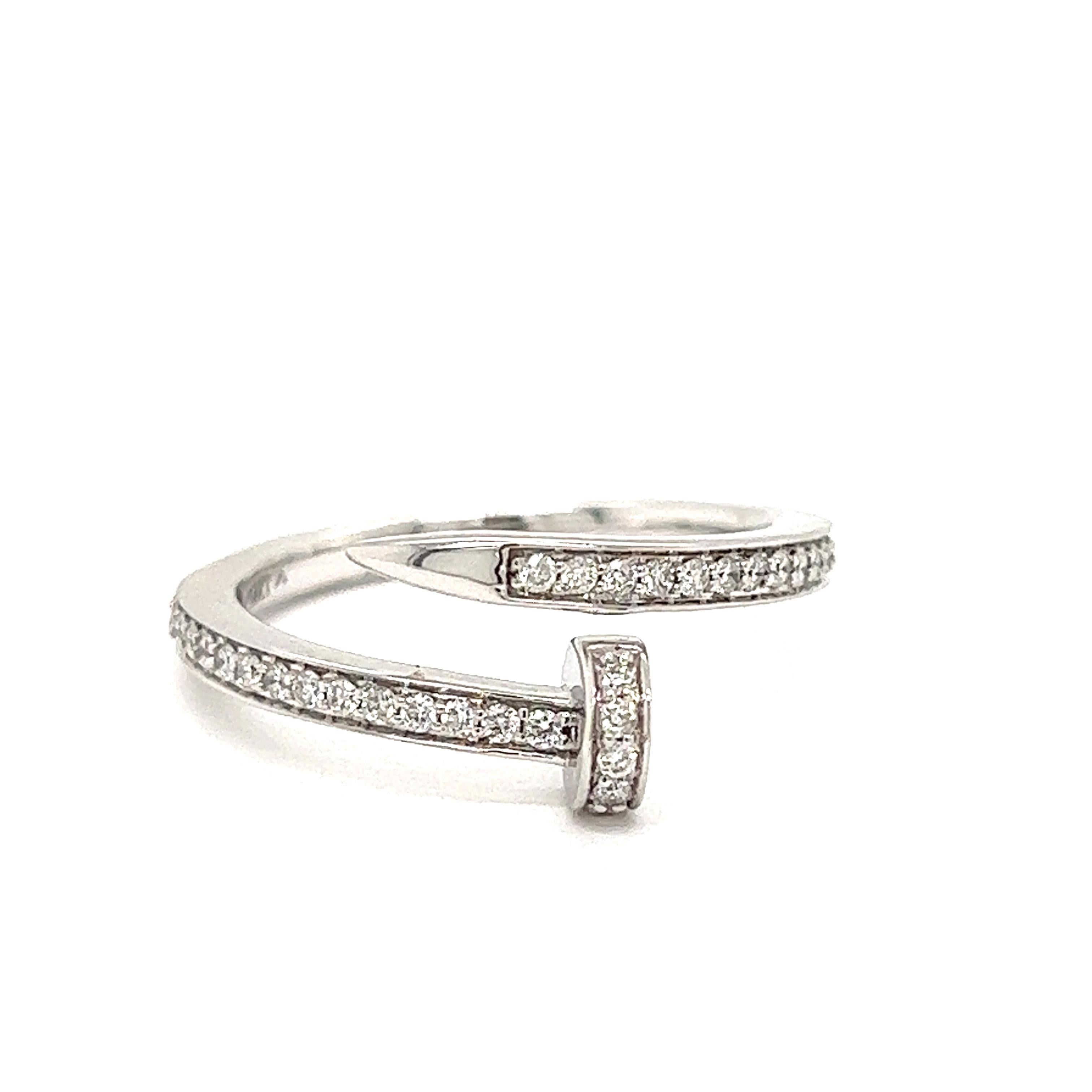 Iconic nail design, this sweet ring is .30 cttw in SI clarity, G-H color diamonds.  The 14 kt white gold ring has a smooth finish and is three grams of gold.

The perfect holiday gift, she will say 