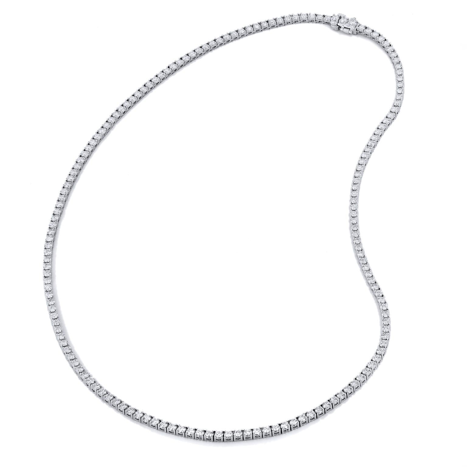 8.27 Carat Diamond Riviera Necklace, set in 18 Karat White Gold 18 Inches Long.

This is handmade and a one of a kind piece. 

You will feel magical in this stunning 18 inch long Riviera necklace will never go out of style, set in 18 karat white