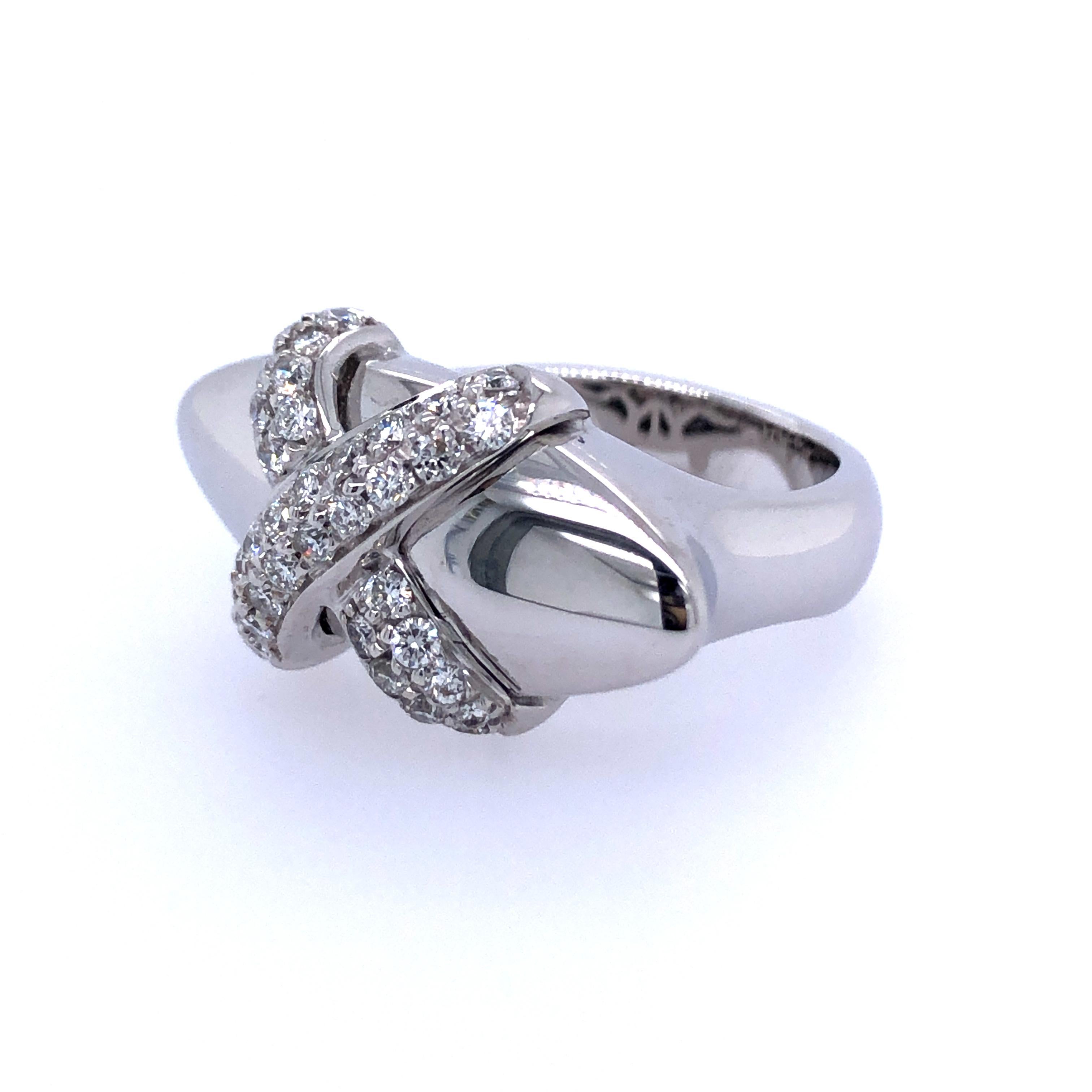Pavé-set with an X of round brilliant-cut diamonds
18k white gold Ring size 6; Gross weight 16.1 g 10.3 dwts 