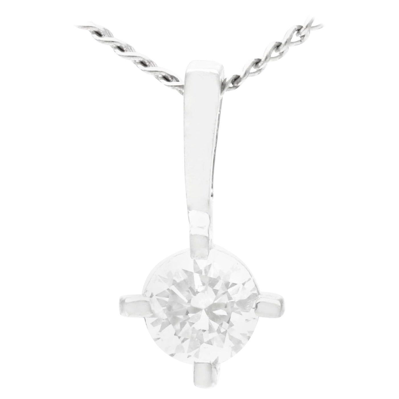Pendentif solitaire en or blanc et diamant