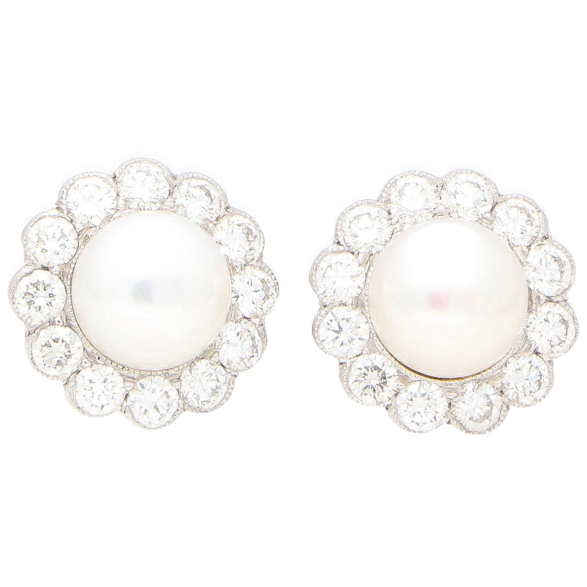 Diamond and White Pearl Cluster Earrings Set in 18 Karat White Gold