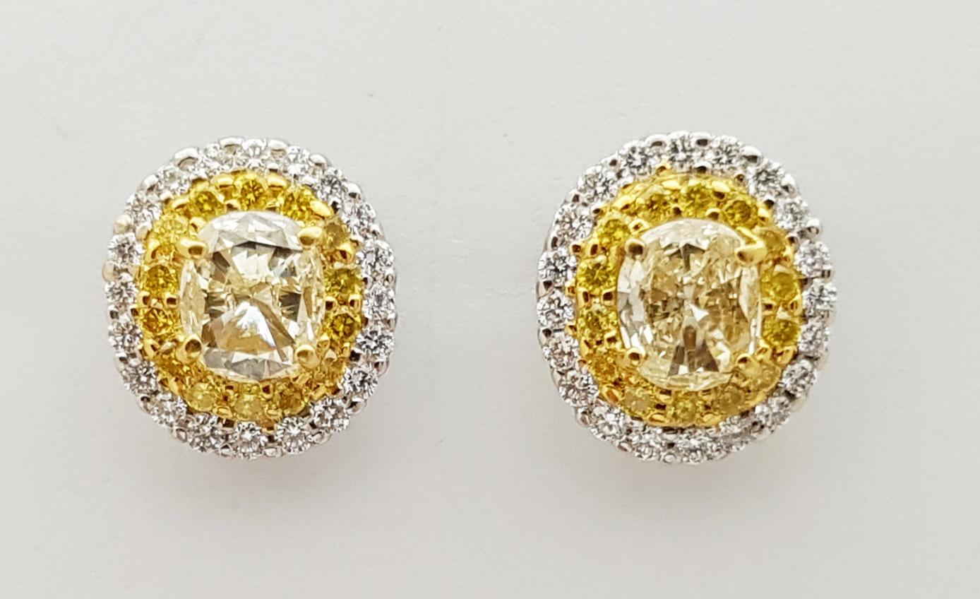 Contemporary Diamond and Yellow Diamond Earrings Set in 18 Karat White Gold Settings For Sale