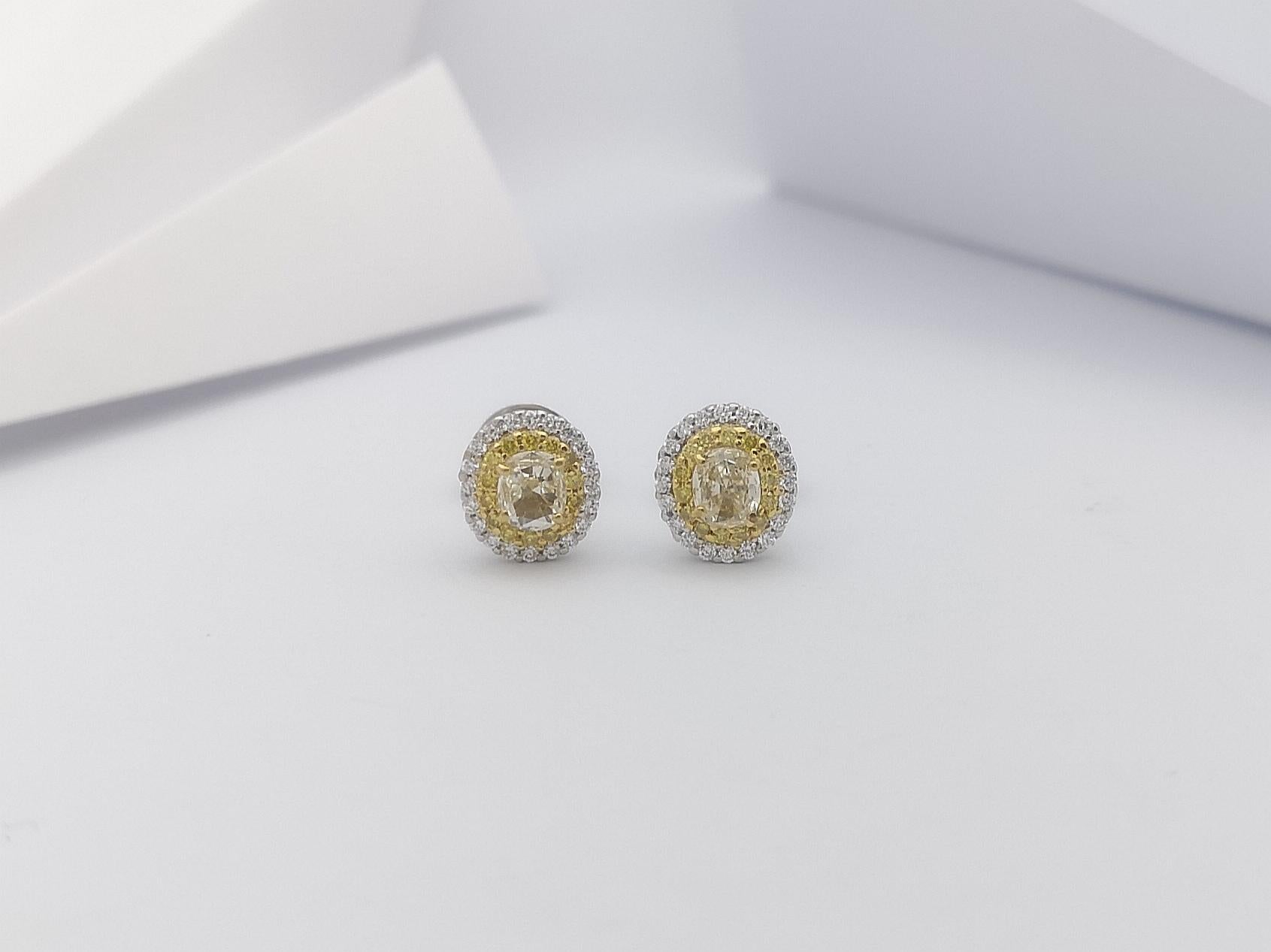 Oval Cut Diamond and Yellow Diamond Earrings Set in 18 Karat White Gold Settings For Sale