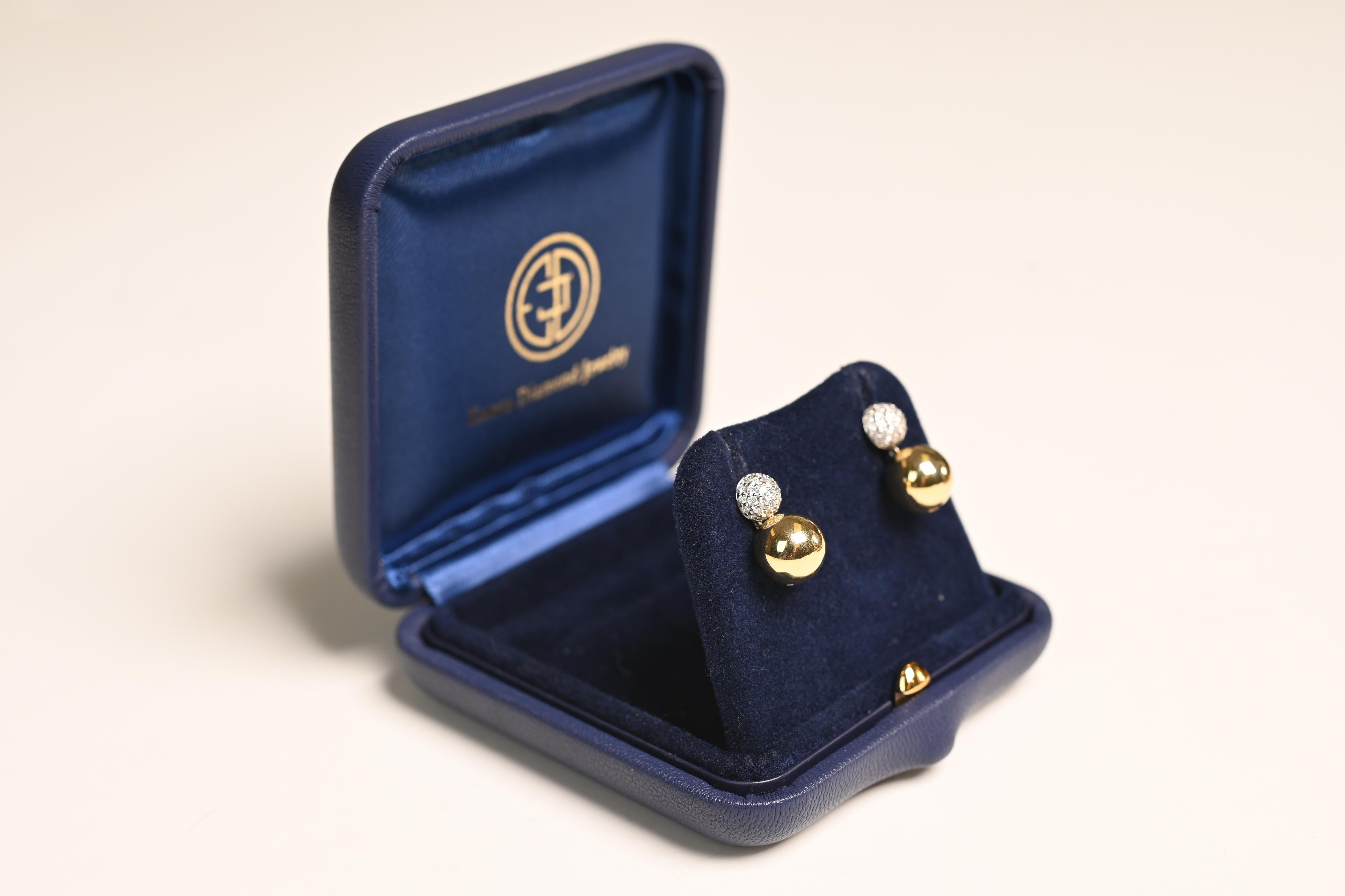 This exquisite pair of earrings is a testament to timeless design and refined craftsmanship. The upper portion is crafted from luxurious 18k white gold, featuring a gently domed silhouette that glistens with a stunning array of pave-set diamonds.