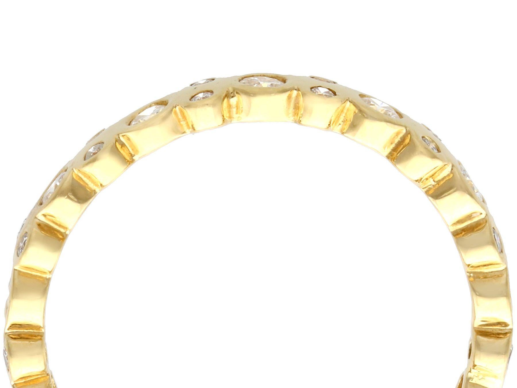 A fine and impressive 0.50 carat diamond and 18 karat yellow gold full eternity ring; part of our diverse vintage jewelry and estate jewelry collections.

This fine and impressive diamond full eternity ring has been crafted in 18k yellow gold.

The