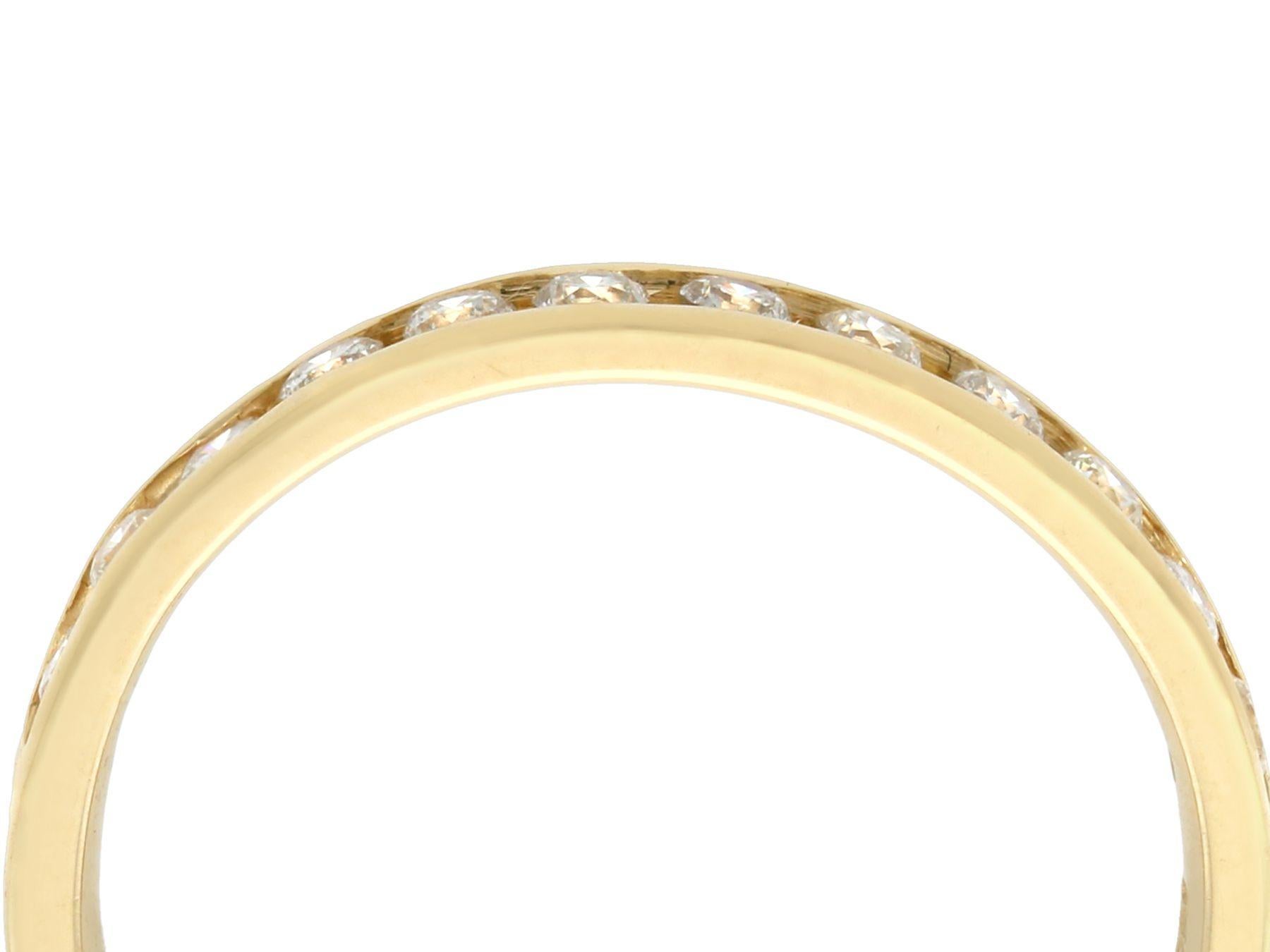 An impressive vintage 1990s 0.39 carat diamond and 14 karat yellow gold half eternity ring; part of our diverse diamond jewelry and estate jewelry collections

This fine and impressive vintage eternity ring has been crafted in 14k yellow gold.

The