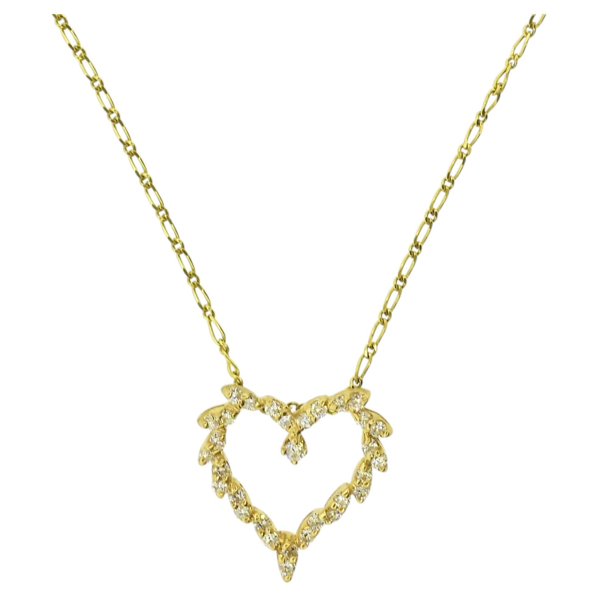 Collar de diamantes y oro amarillo con motivo de corazón en venta