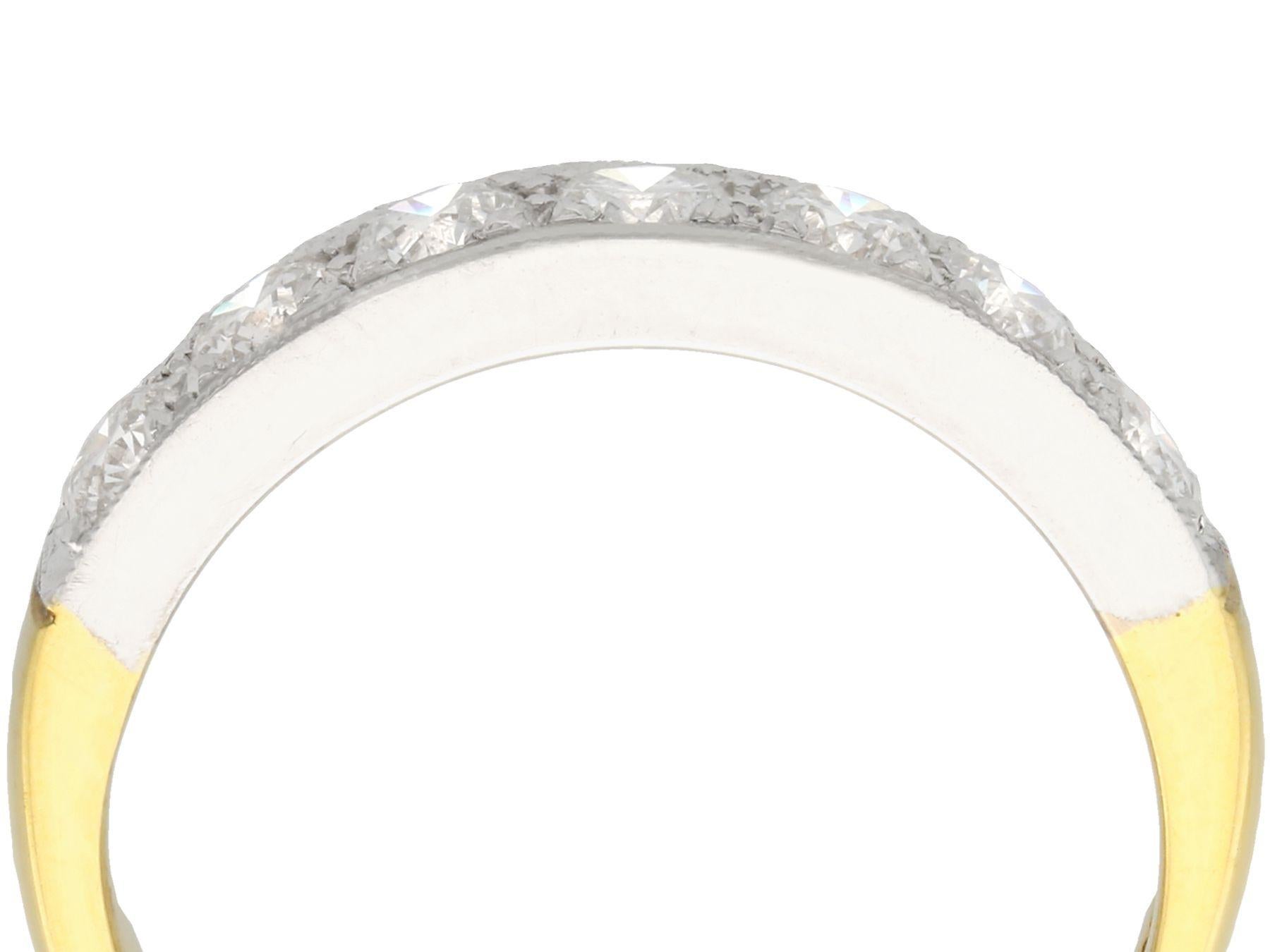 A fine and impressive 0.95 carat diamond, 18 karat yellow gold, platinum set, half eternity ring; part of our contemporary jewelry and jewelry collection

This fine contemporary half eternity diamond ring has been crafted in 18k yellow gold with a