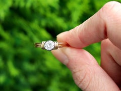 Diamond and Yellow Gold Solitaire Engagement Ring