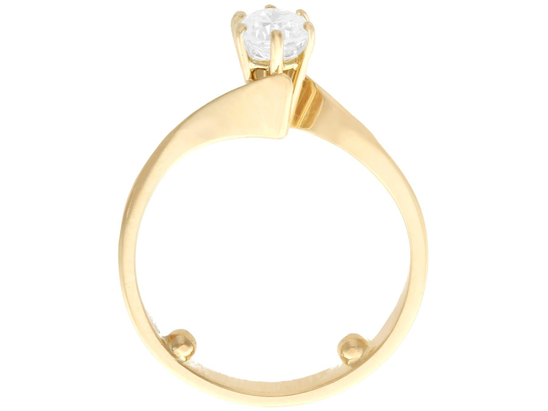 Round Cut Diamond and Yellow Gold Solitaire Twist Engagement Ring For Sale