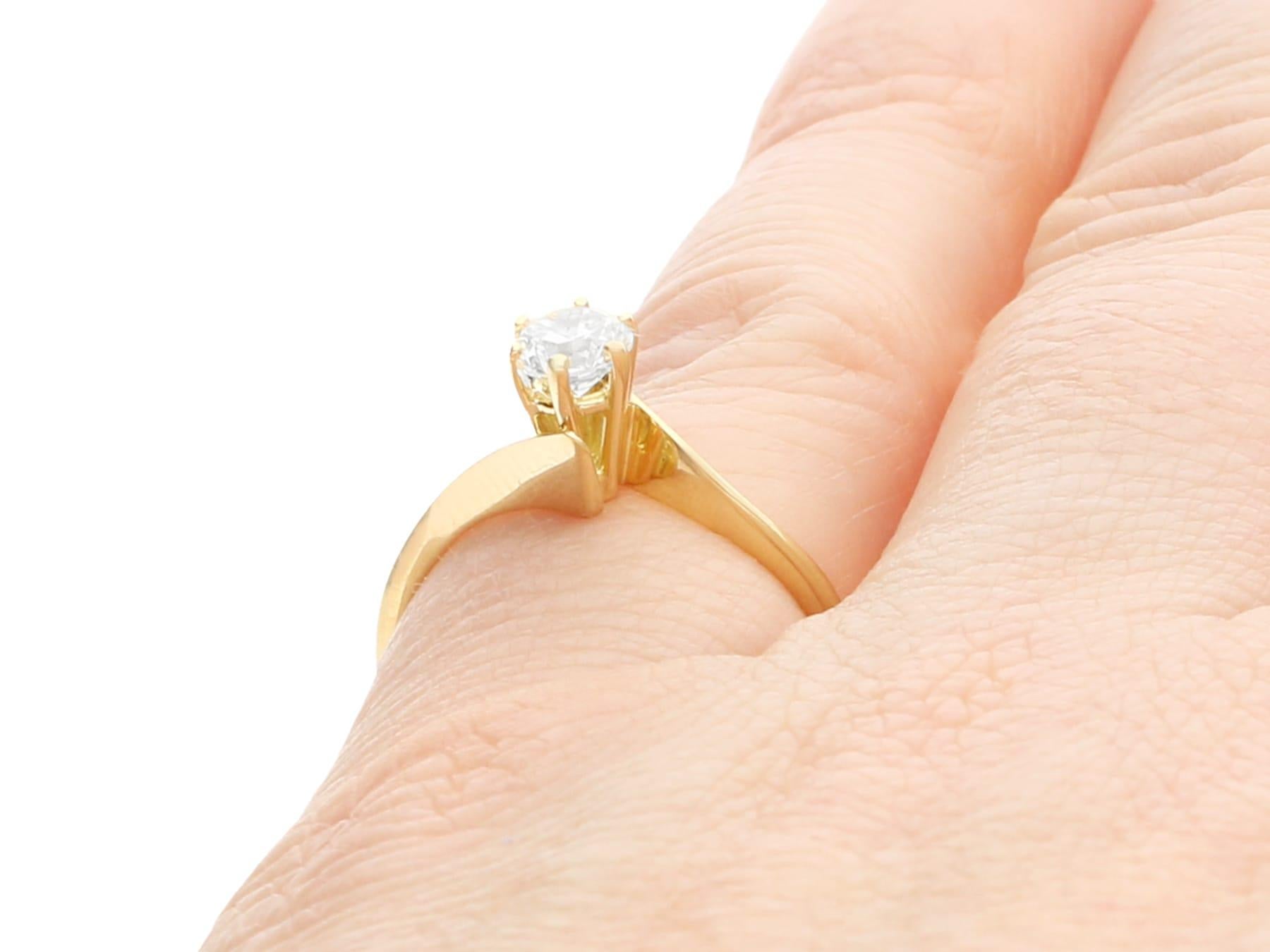 Diamond and Yellow Gold Solitaire Twist Engagement Ring For Sale 1