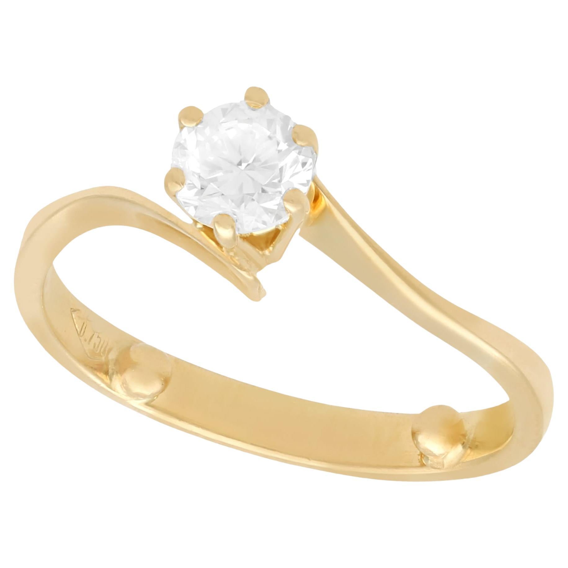 Diamond and Yellow Gold Solitaire Twist Engagement Ring For Sale