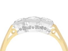Verlobungsring aus Diamant und 18 Karat Gelbgold mit drei Steinen