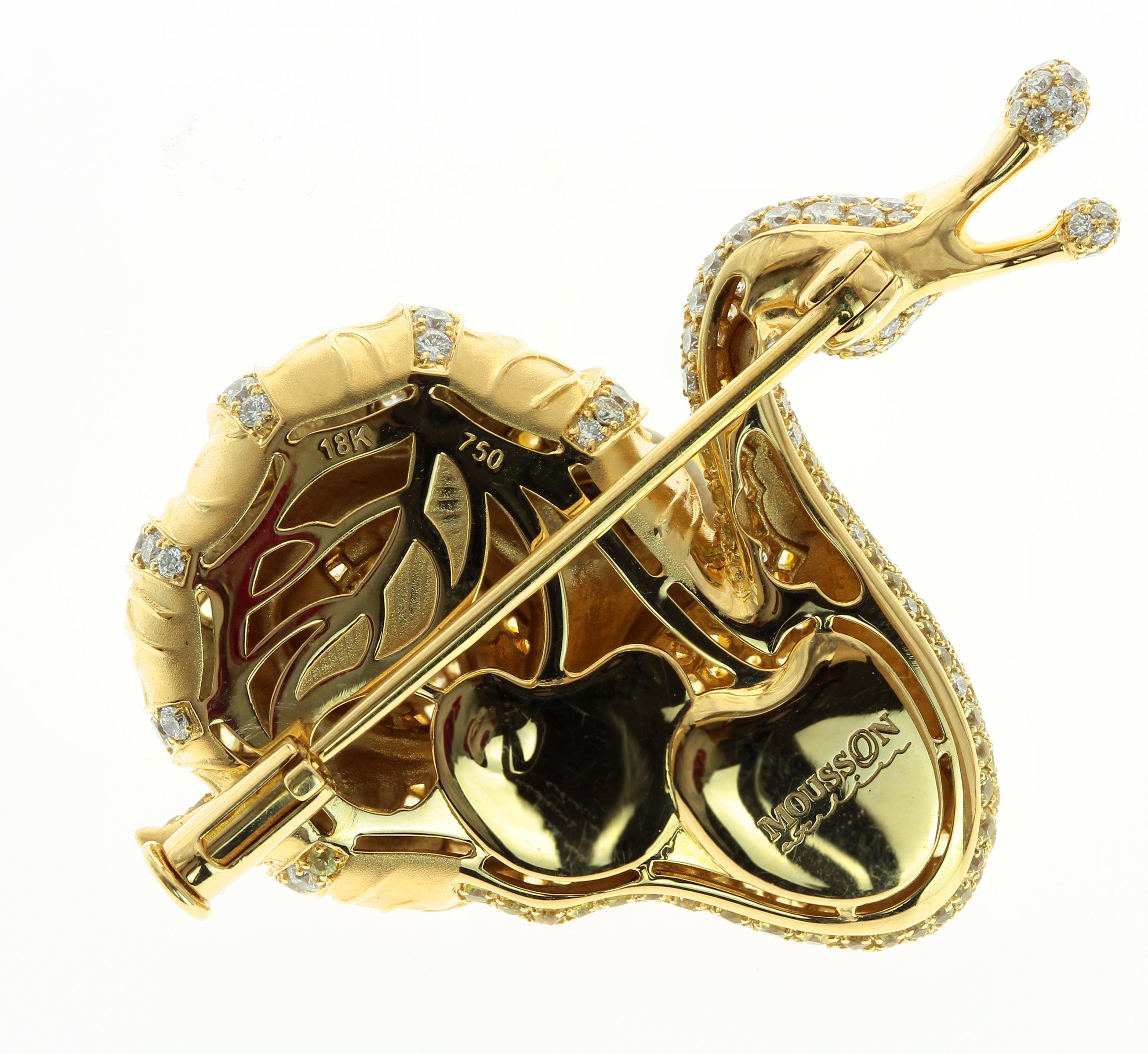 18 Karat Yellow Gold, Diamond, Yellow Sapphire Snail Brooch

Adorn yourself with this exquisite 18 Karat Yellow Gold brooch from the Eden collection. The delicate snail design radiates opulence and sophistication with sparkling diamonds and yellow