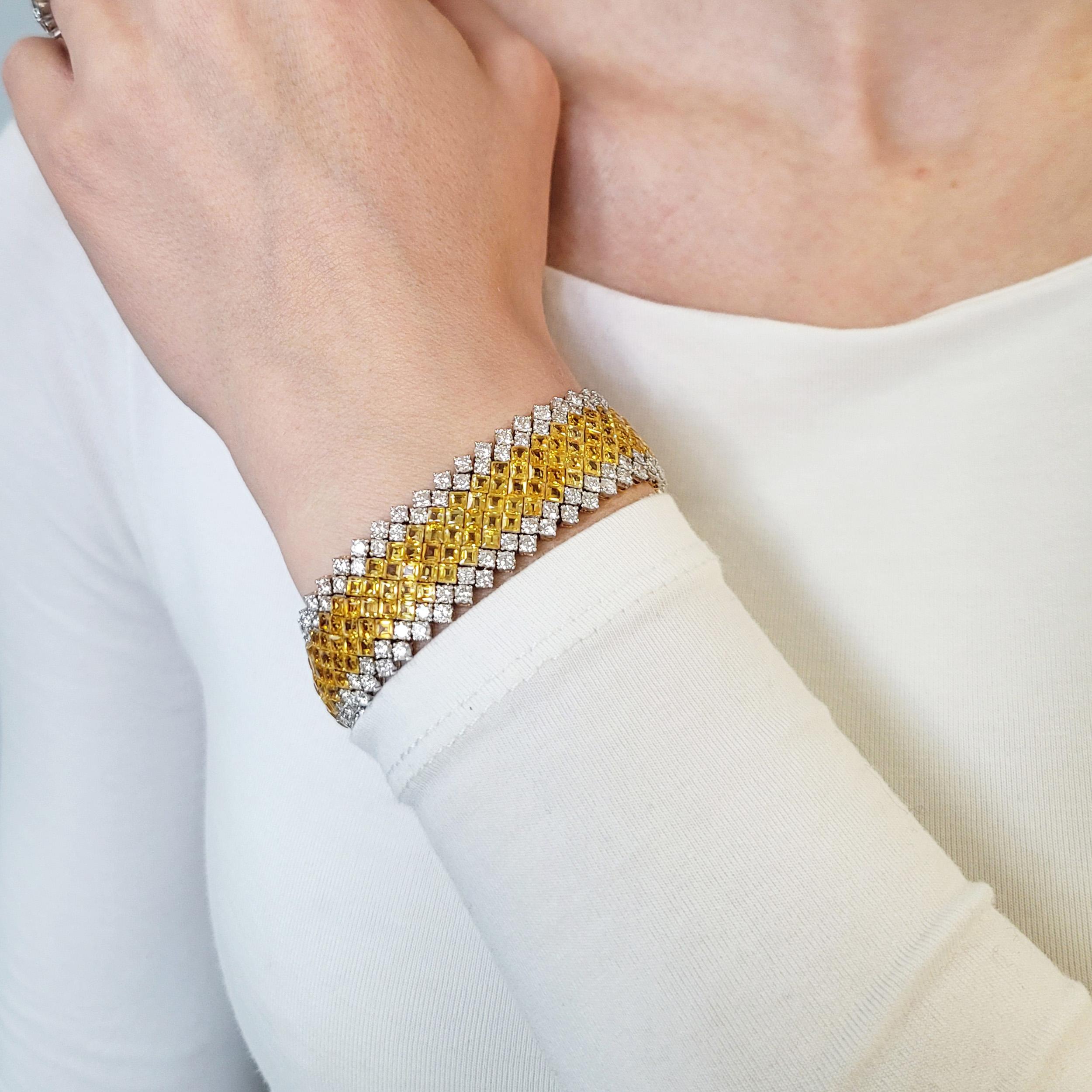 Diamond and Yellow Sapphire Bracelet
This bracelet has 92 round diamonds weighing a total of 4.6 carat, and 230 square yellow sapphires weighing a total of 40-45 carat, all set in 18k yellow gold.
 Serial Number: 11347, 750 for 18k yellow gold.