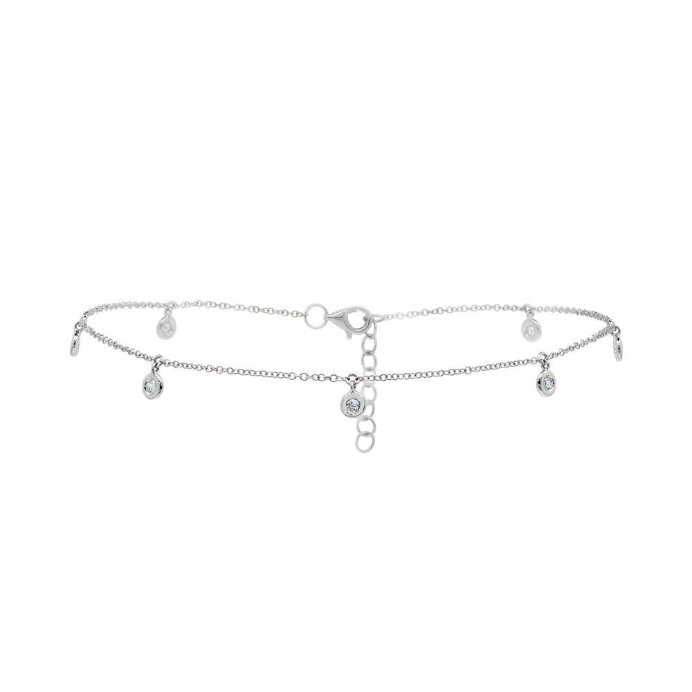 This beautiful bezel set diamond anklet is 9 inches long. It is made of 14 karat white gold.

In some cultures, anklets are also believed to have spiritual or supernatural powers. They are worn to ward off evil spirits, bring good luck, or as a form