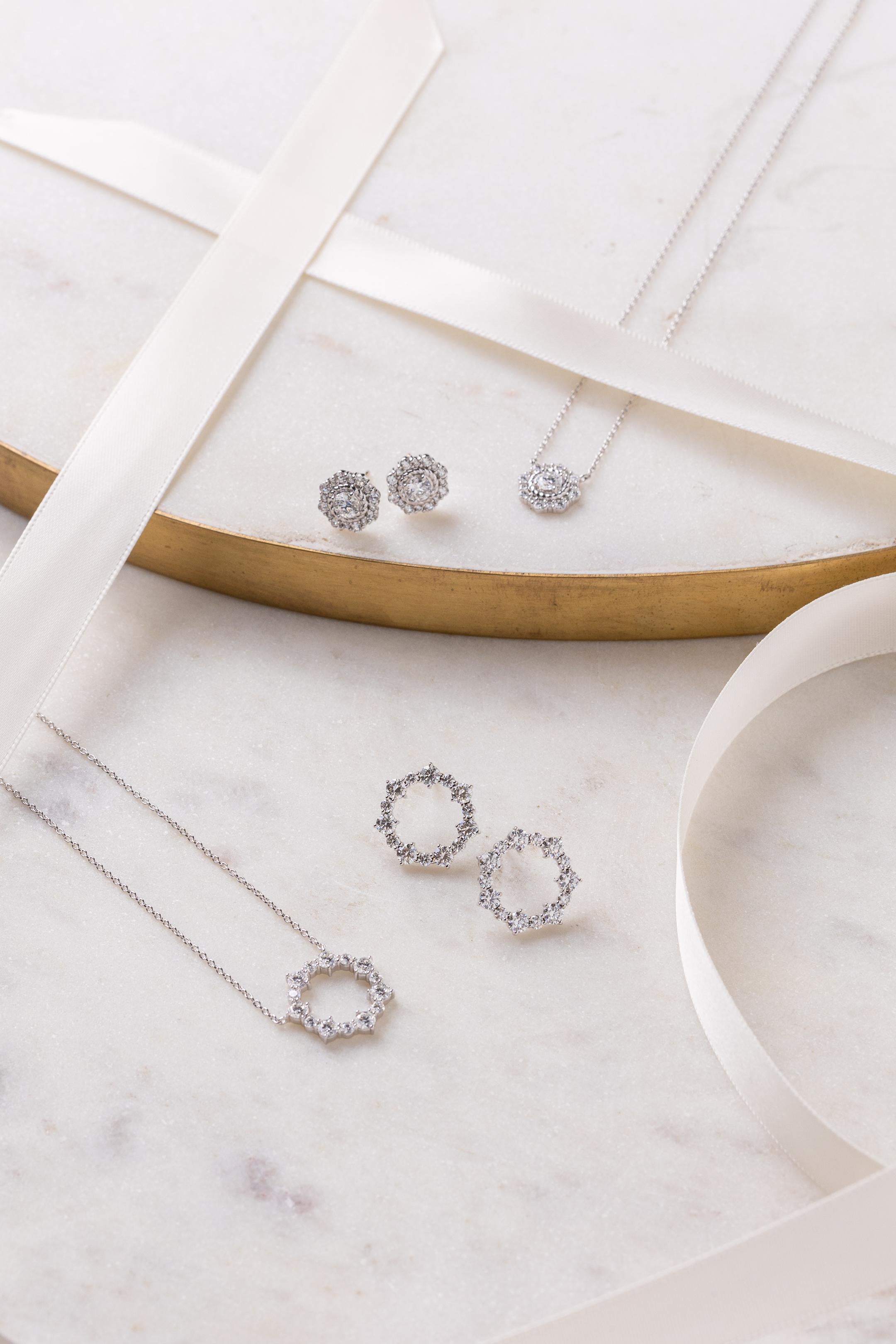 The Diamond Ava Circle Pendant is a classic every day necklace with a lot of bling.