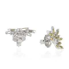 Pendientes de oro de 18 quilates con diamantes en forma de estrella