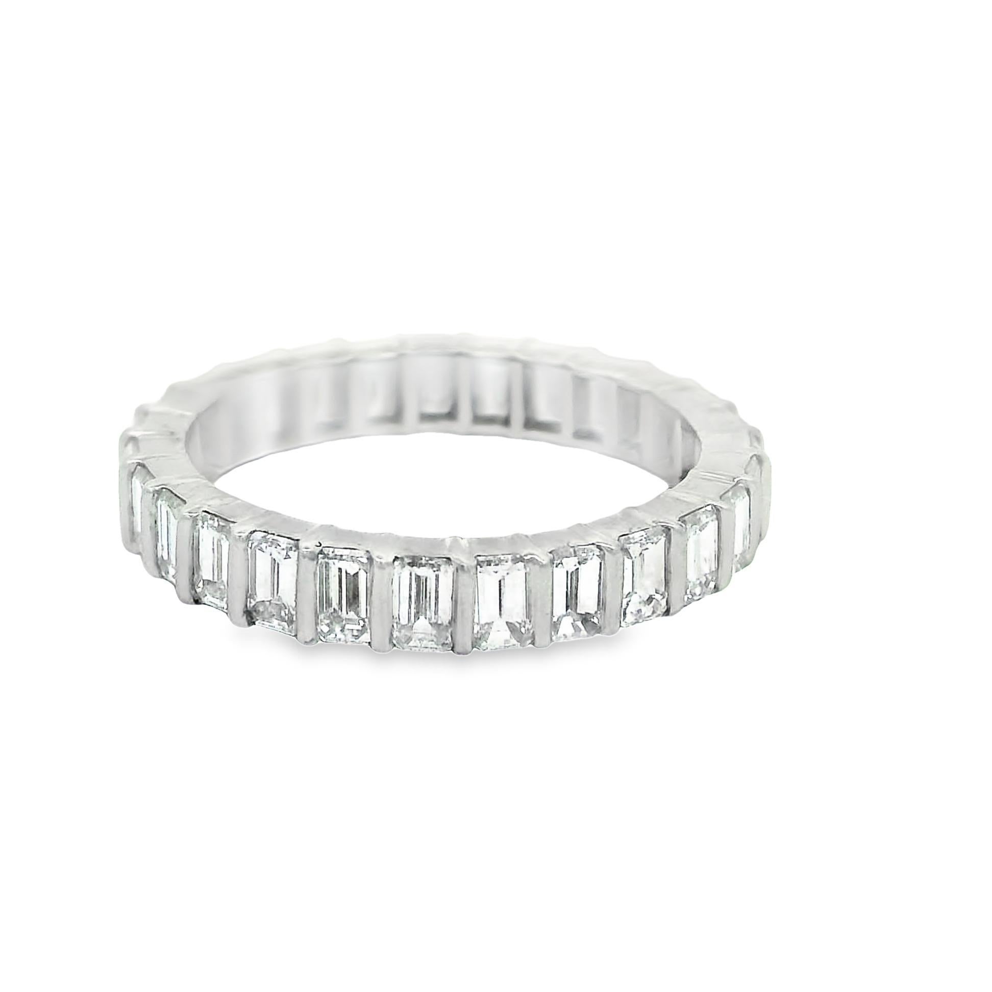 A classic diamond eternity ring featuring 2.18 carats of baguette cut diamonds. They are perfectly matching in size and color making it an impressive array of diamonds. Hand fabricated in platinum and ready to be worn.

Ring Size 5.75

Weight: 3.9