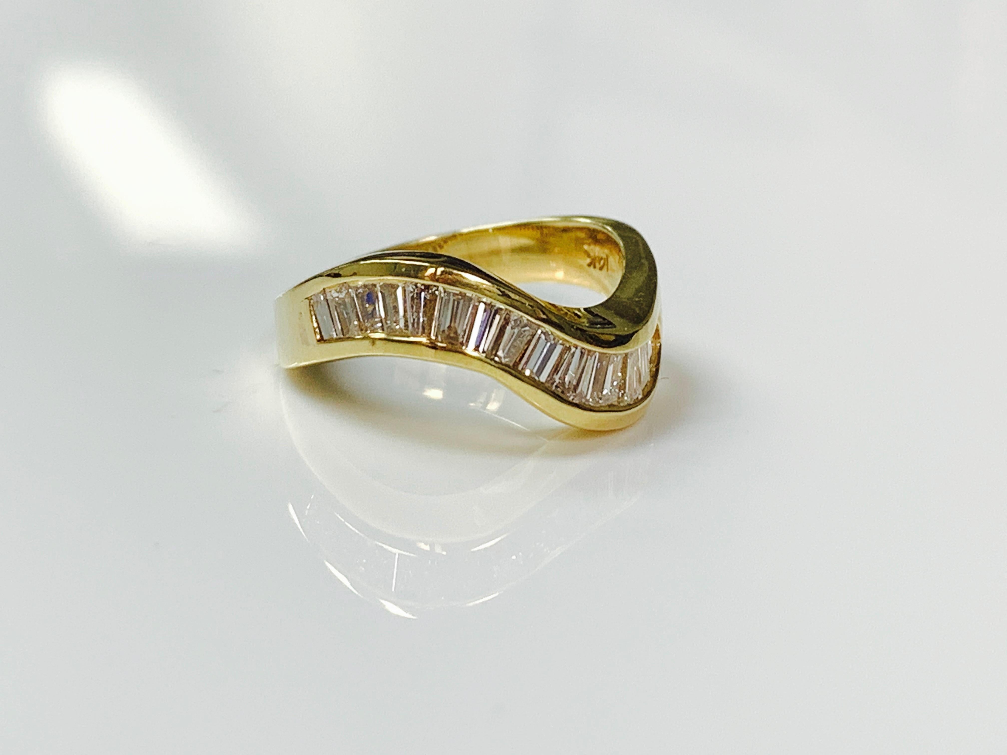 Diamond Baguette Ring handmade in 14 K Yellow Gold. 
Diamond Weight : 1.15 carat 
Metal : 14 k yellow gold 
Ring Size : 6 