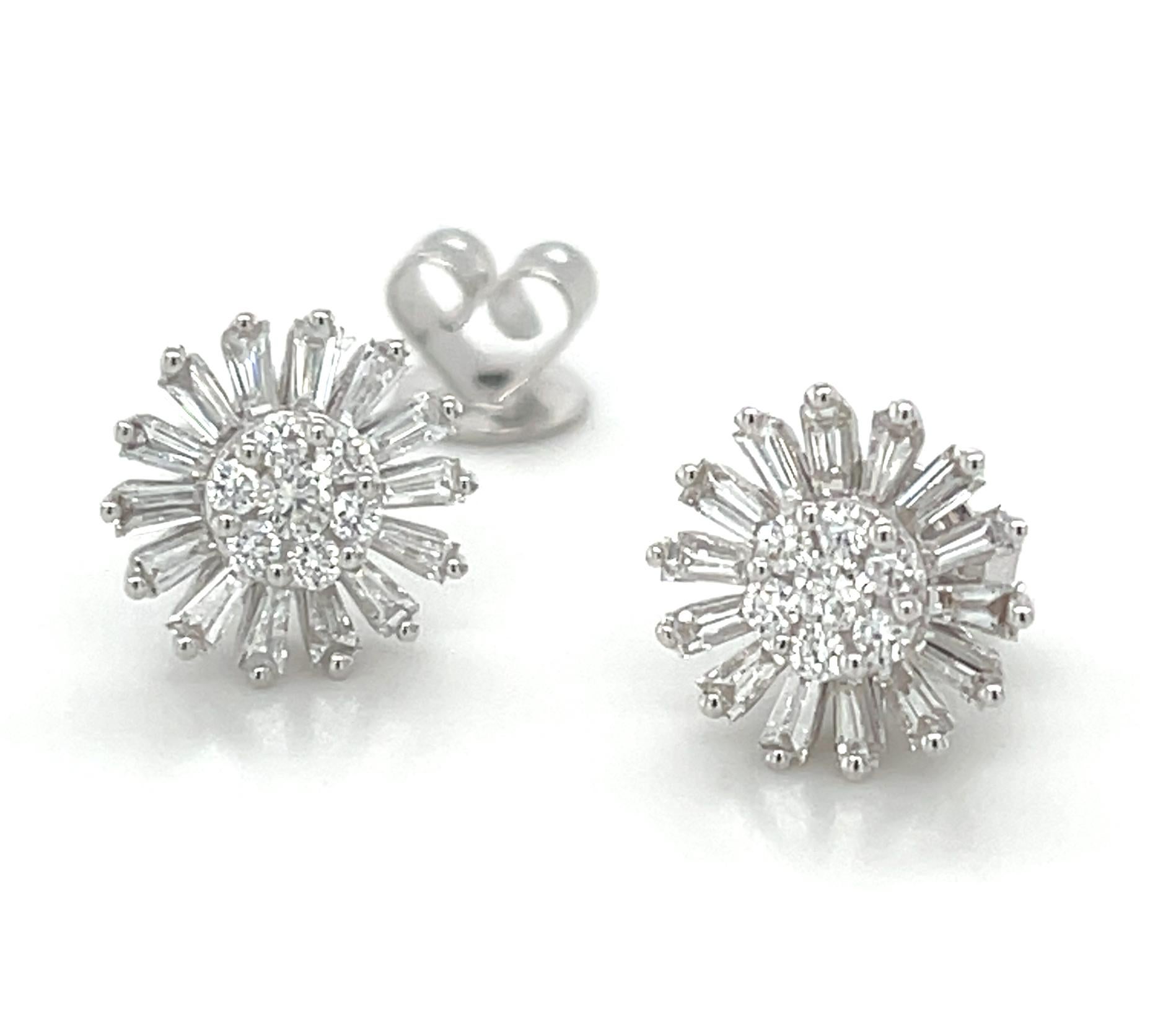 These pretty diamond earrings are a perfect way to brighten up any outfit! Delicate diamond baguettes are arranged in a starburst pattern around a diamond-studded center, reminiscent of a cheerful sunflower! Suitable for both daytime and evening
