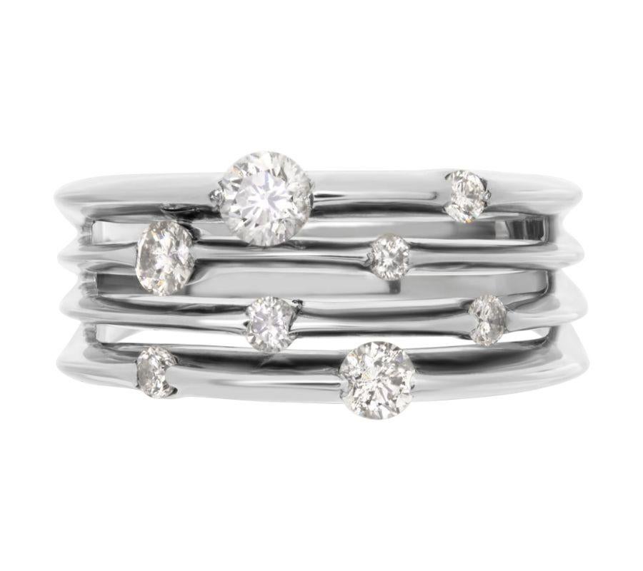 Diamond band in 14k white gold with different size diamond 