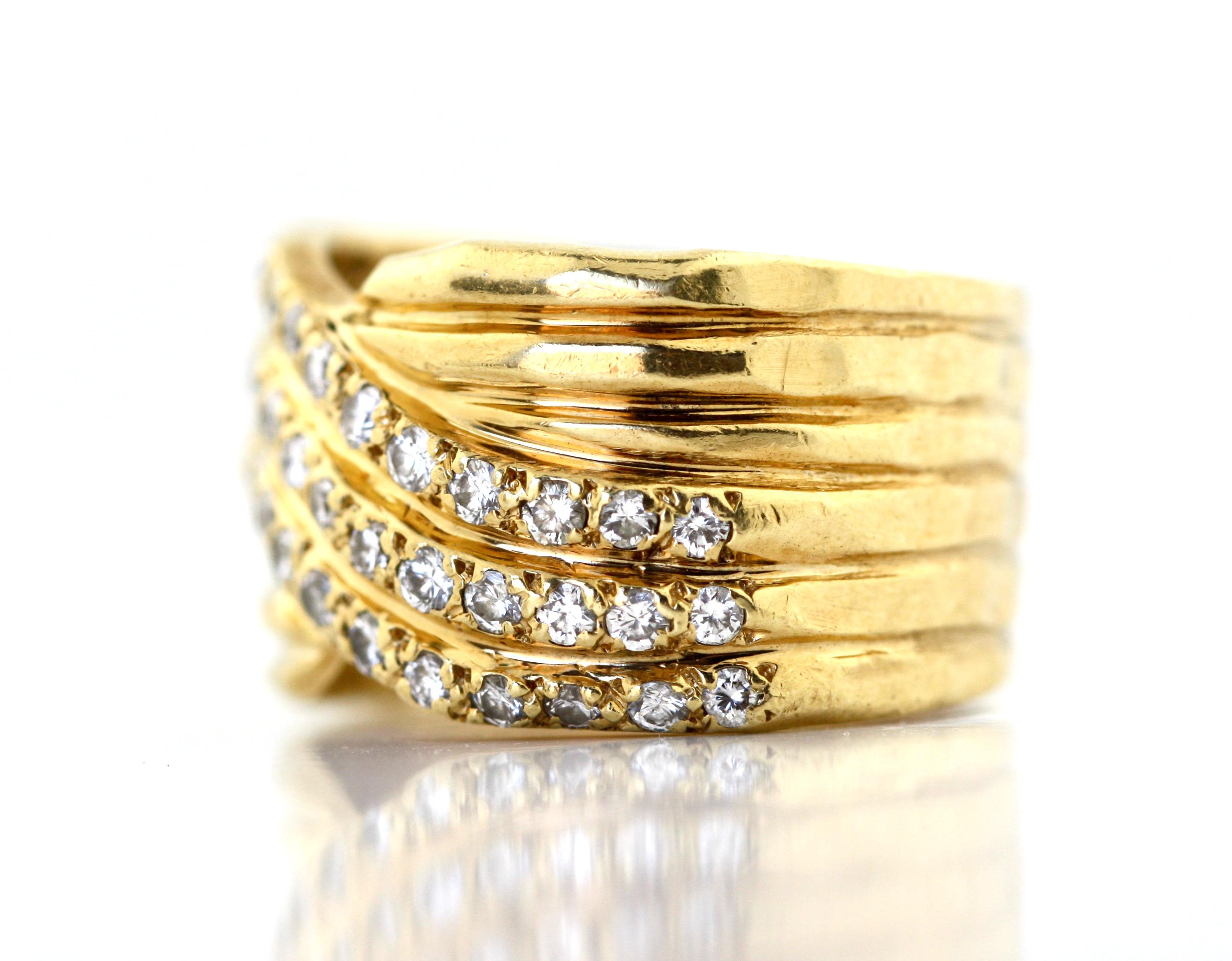 Diamond Band Ring
Designed as a band of bezel-set round diamonds, size 8, mounted in 18 karat yellow gold, gross weight approximately 12 grams
