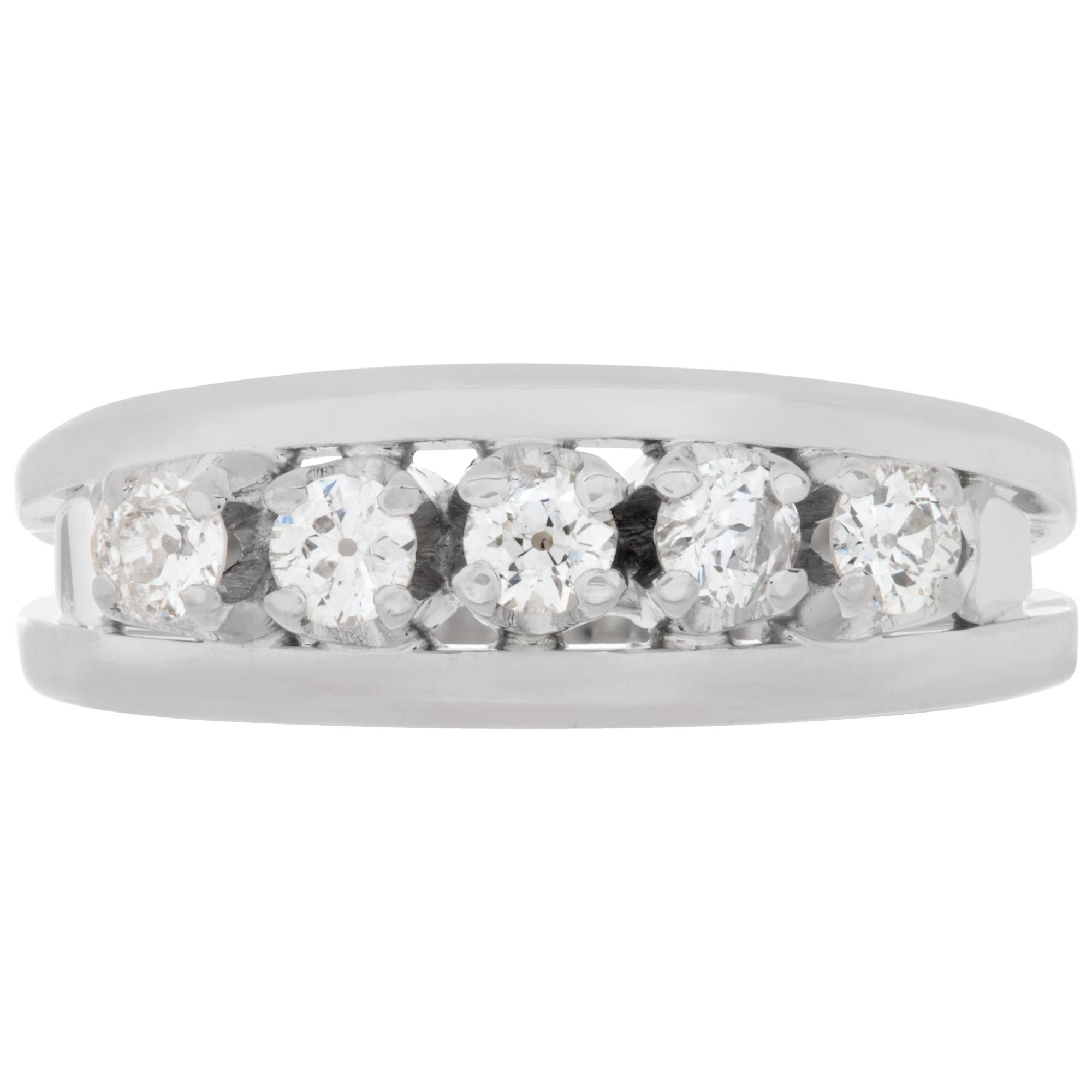 Classic diamond band with approximately 0.35 carat in round brilliant diamonds set in 18k white gold. Size 7.This Diamond ring is currently size 7 and some items can be sized up or down, please ask! It weighs 2.9 pennyweights and is 18k White Gold.