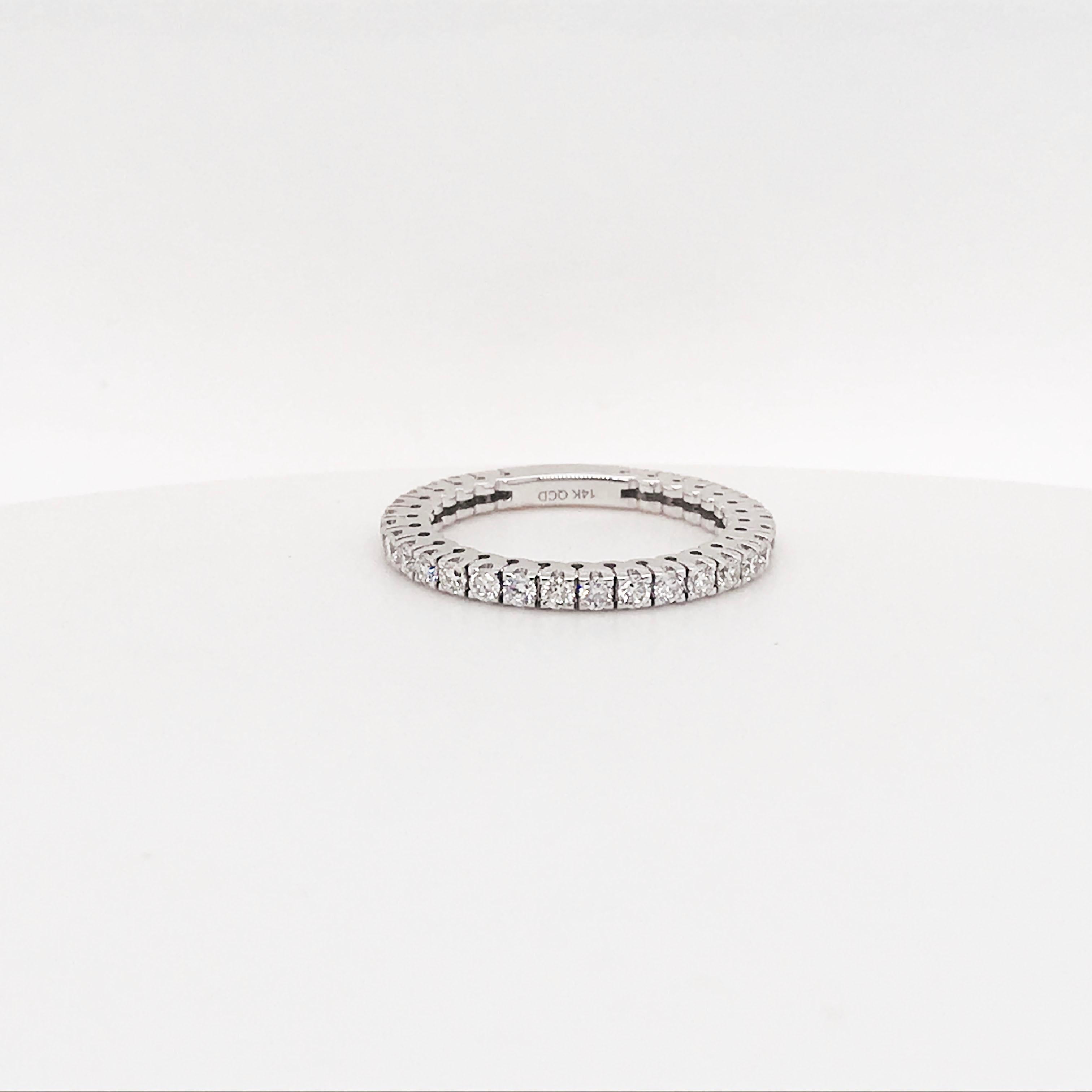 Diamond bands are a classic jewelry staple! Every woman wants one and every women deserves one. This diamond band has round brilliant diamonds going 4/5 around the entire ring. There is a small sizing bar in the back for future resizing. The