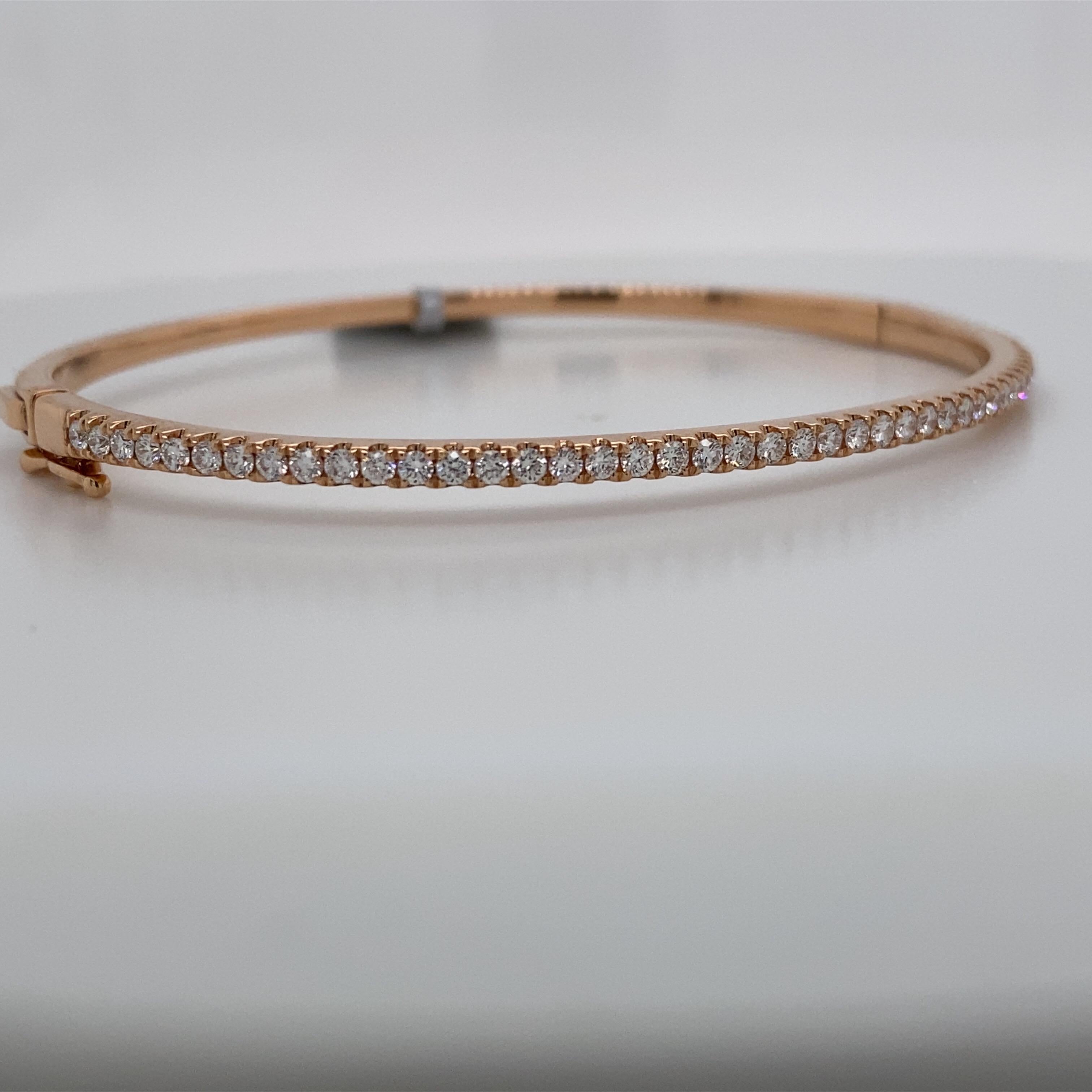 18K Rose gold bangle bracelet featuring 45 round brilliants weighing 0.85 carats.

Great for stacking!
Available in yellow & white gold. 