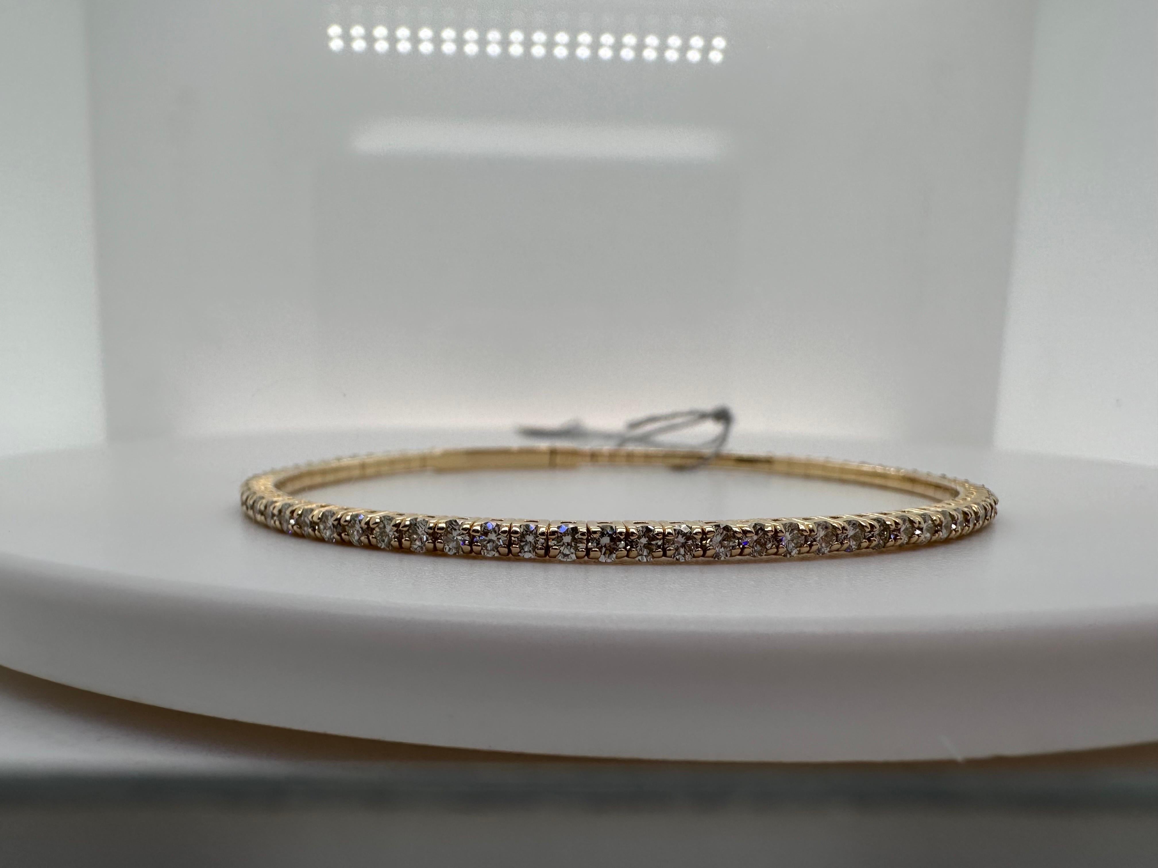 Simple and elegant diamond bracelet super comfortable and flexible made in 14KT gold!

Metal Type: 14KT
Gram Weight:8.20 grams 
Natural Diamond(s): 
Color: G
Cut:Round Brilliant
Carat: 2.25ct
Clarity: VS (average)
Item: T5000
Certificate of